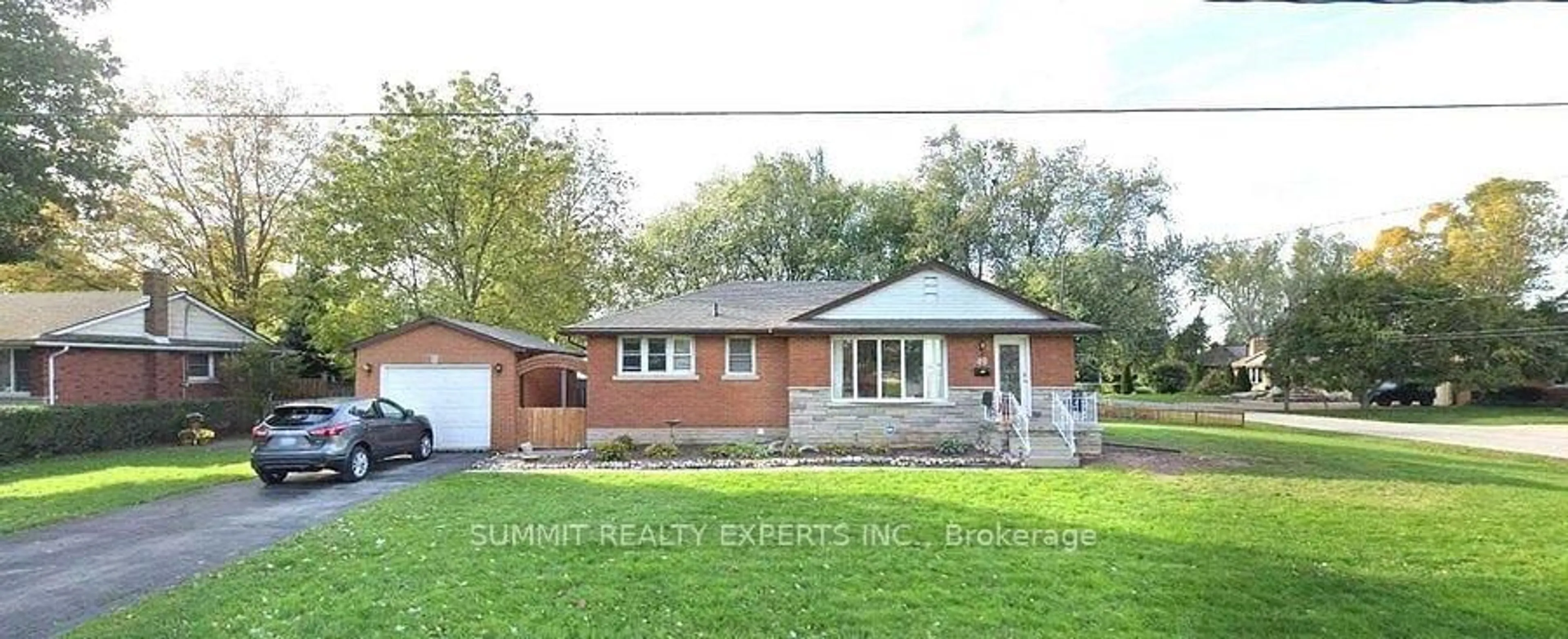 Home with brick exterior material, street for 49 Whittaker Ave, Grimsby Ontario L3M 3J3