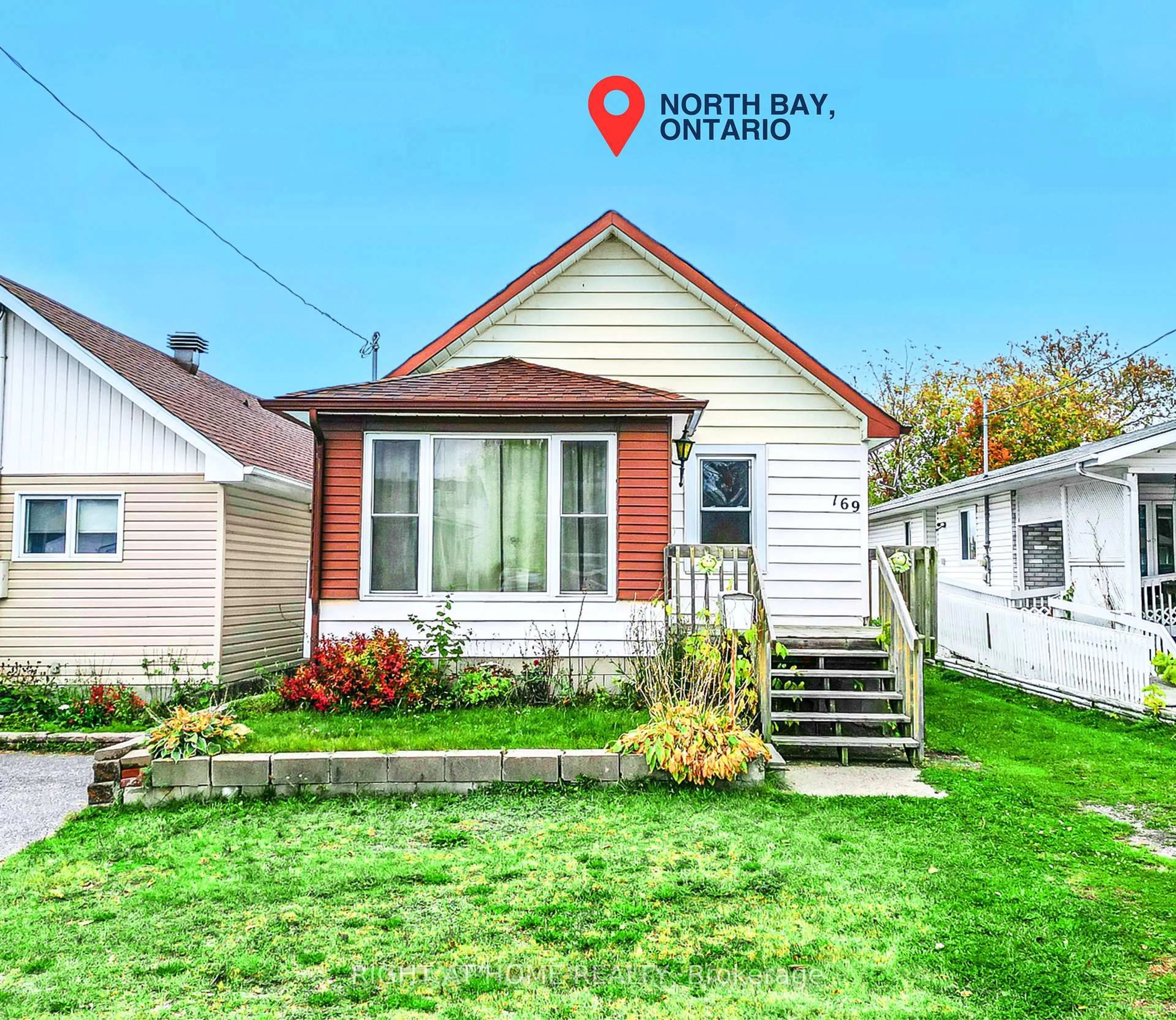 Home with vinyl exterior material, street for 169 Princess St, North Bay Ontario P1B 1P8