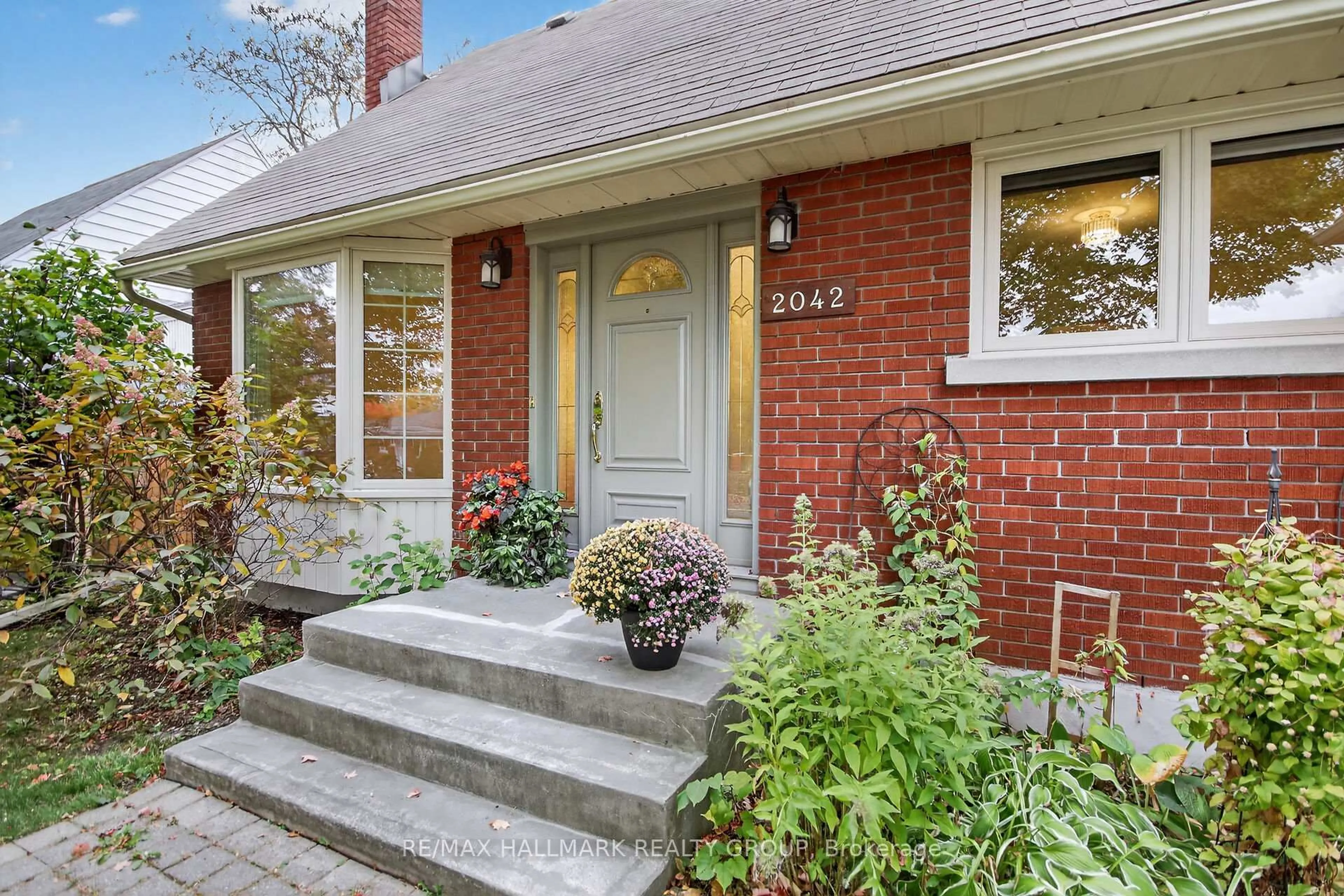 Home with brick exterior material, street for 2042 Tilson St, Ottawa Ontario K1G 2M7