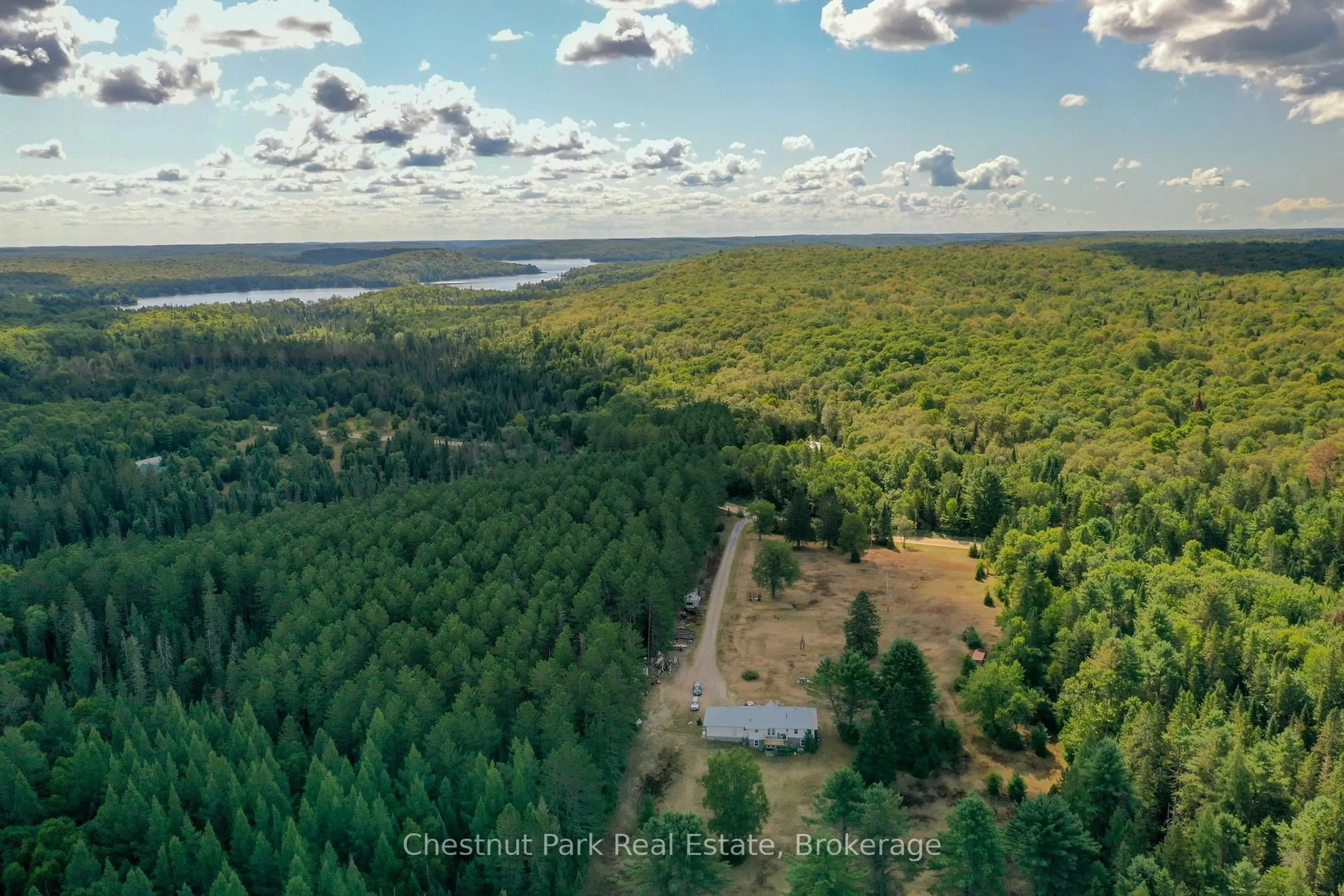 A pic from outside/outdoor area/front of a property/back of a property/a pic from drone, forest/trees view for 158 Selena Dr, McMurrich/Monteith Ontario P0A 1Y0