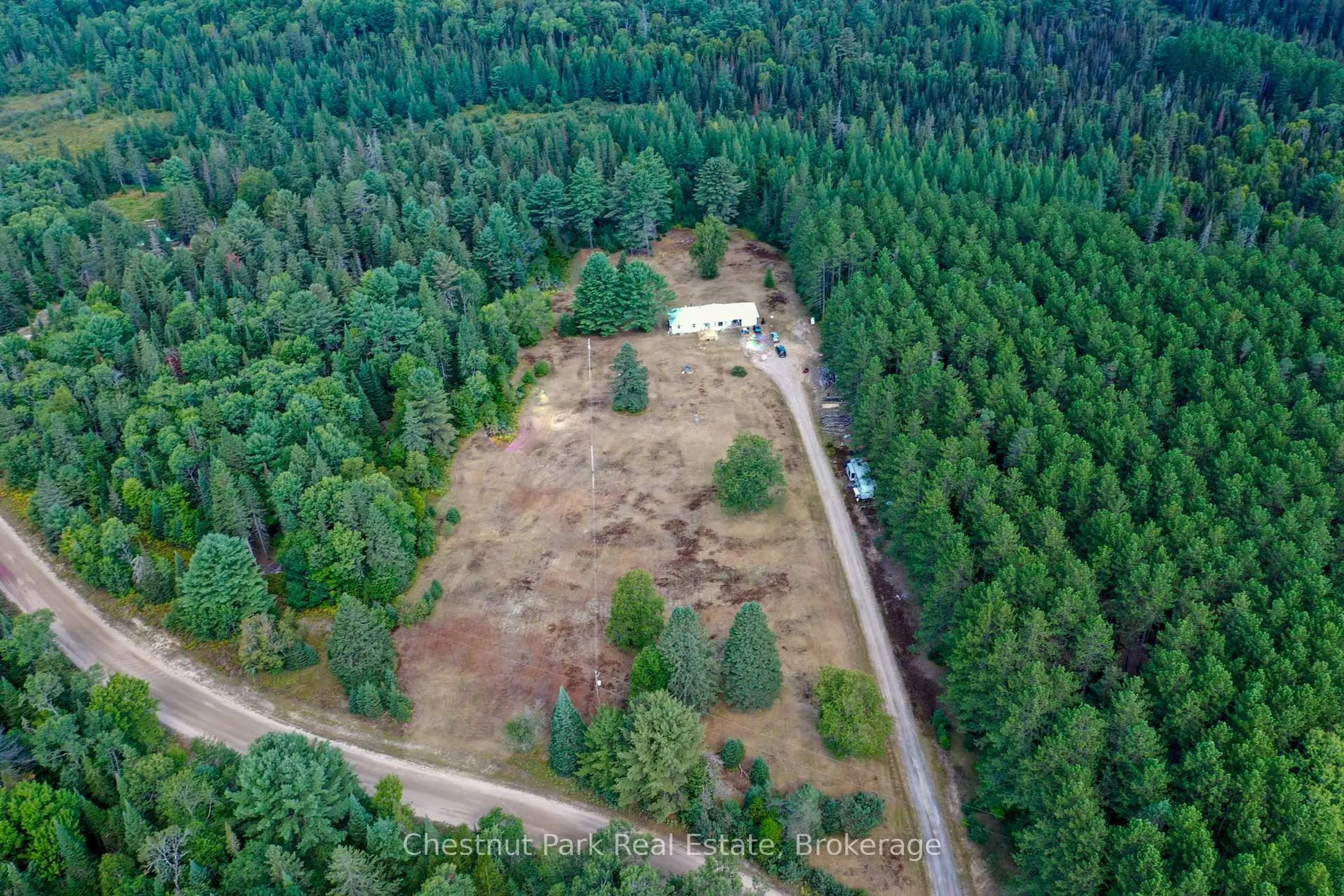 A pic from outside/outdoor area/front of a property/back of a property/a pic from drone, forest/trees view for 158 Selena Dr, McMurrich/Monteith Ontario P0A 1Y0
