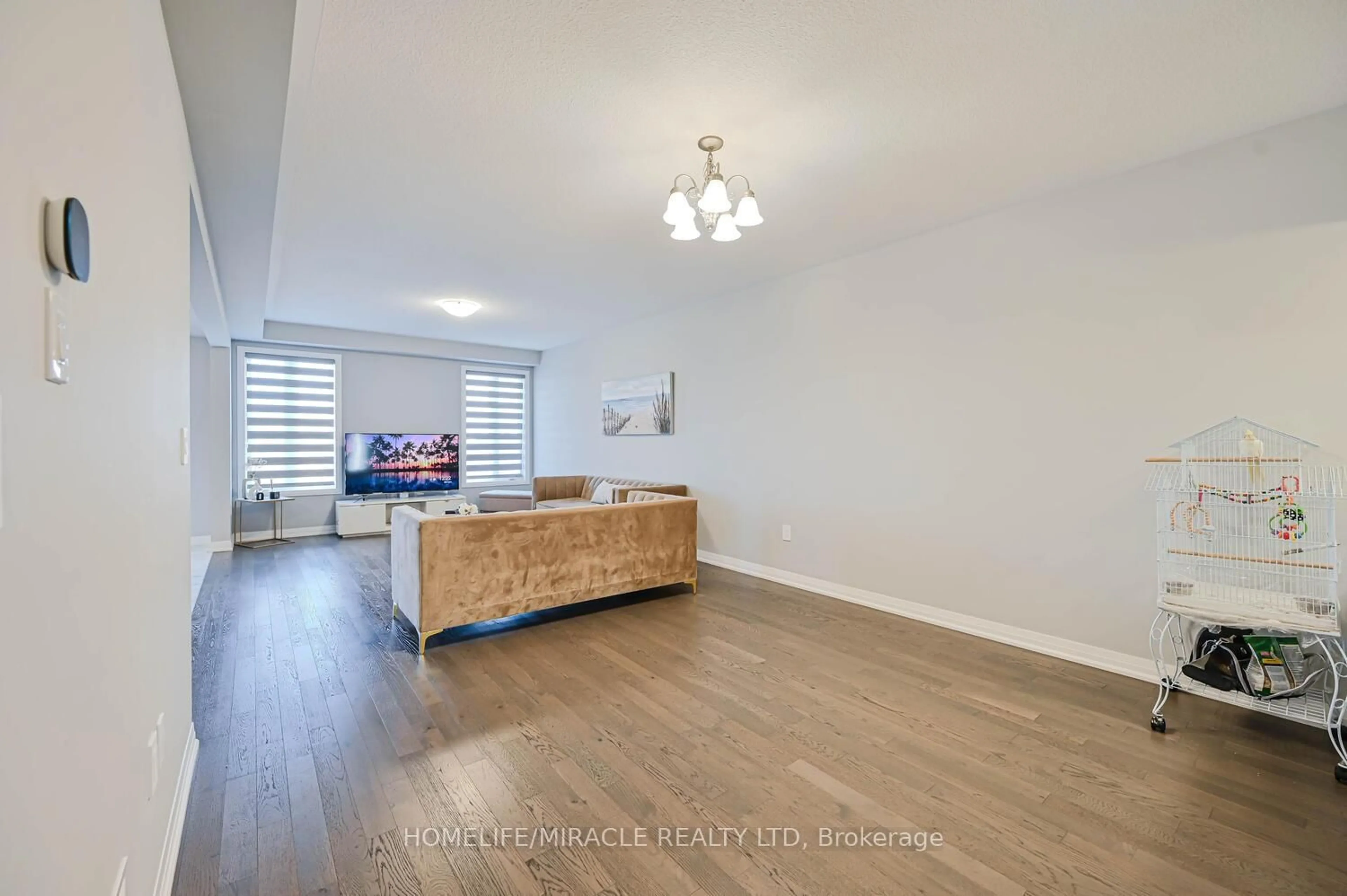Living room with furniture, wood/laminate floor for 148 Cittadella Blvd, Hamilton Ontario L0R 1P0