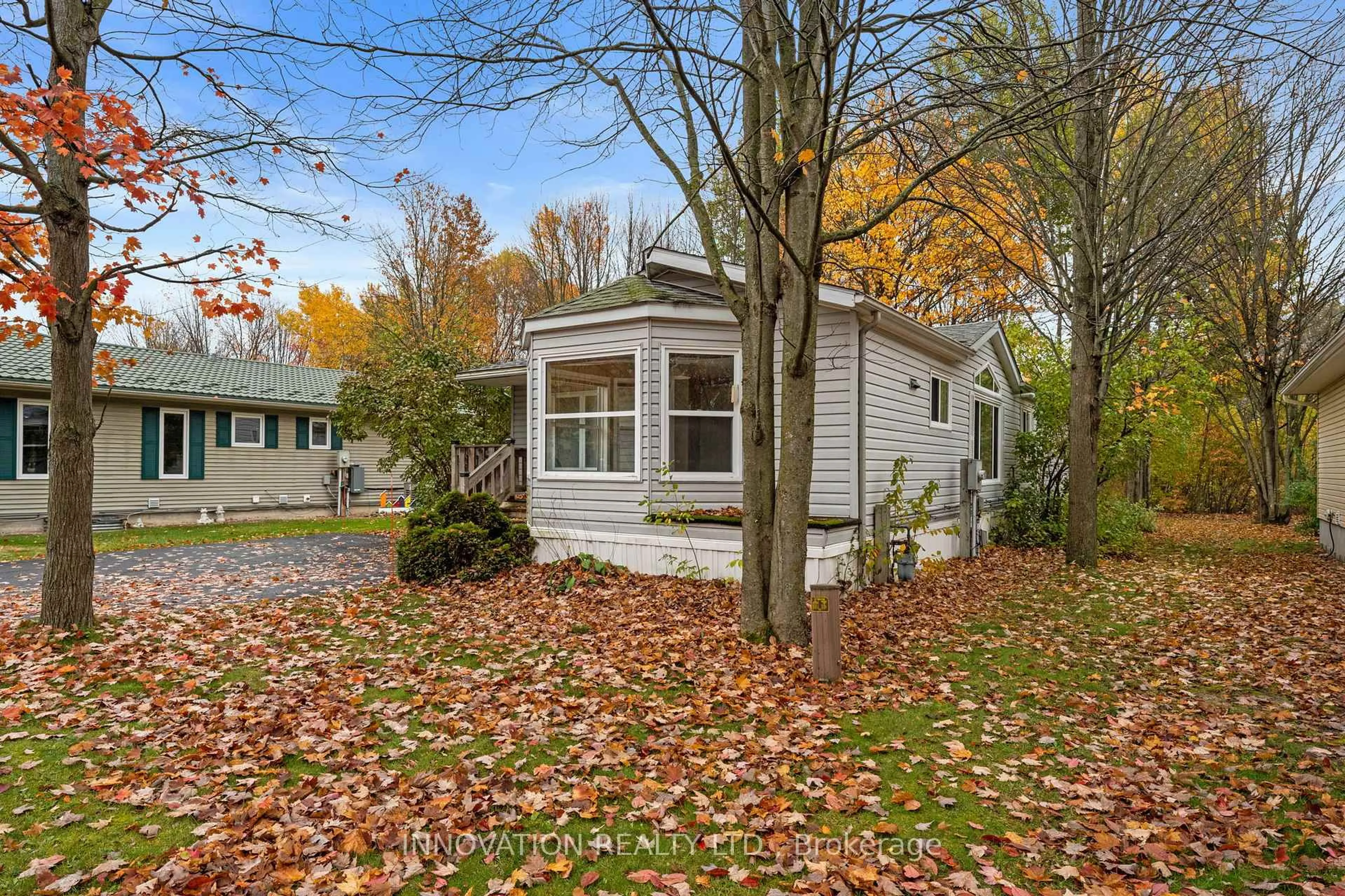 Home with vinyl exterior material, street for 6628 Vista Patrick Private, Ottawa Ontario K4P 1C9