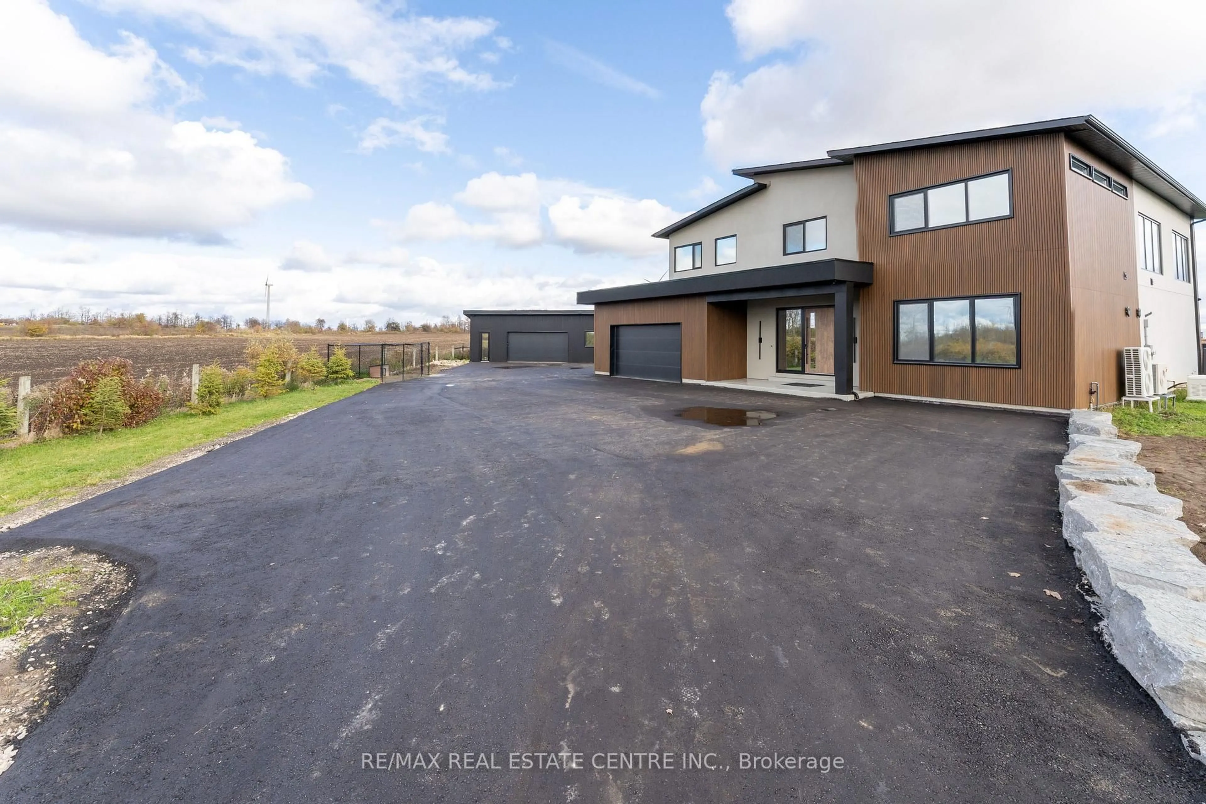 A pic from outside/outdoor area/front of a property/back of a property/a pic from drone, unknown for 295449 8th Line, Amaranth Ontario L9V 1K4