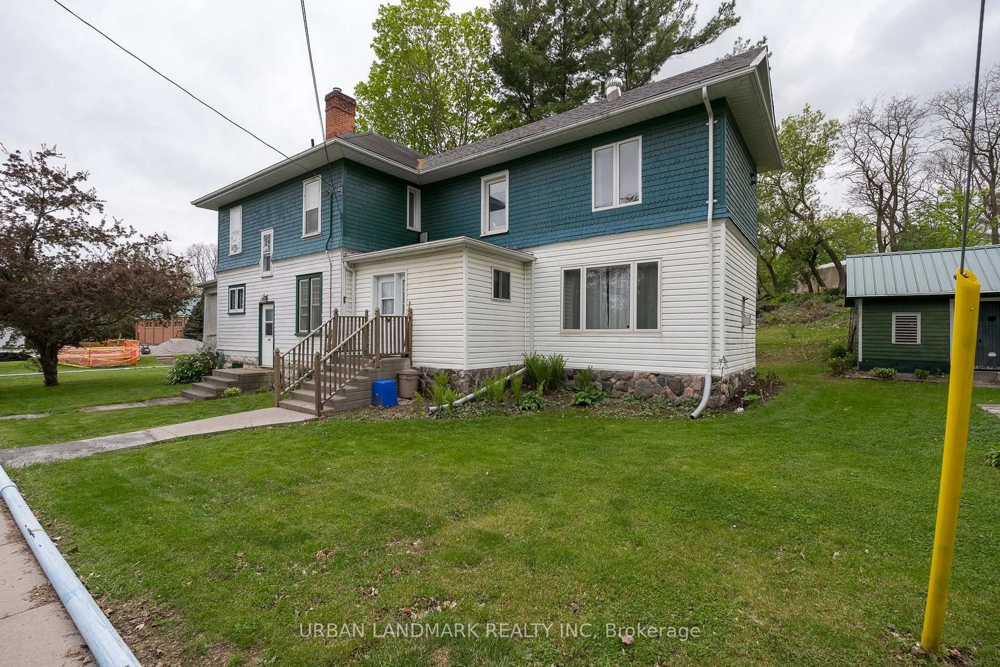 A pic from outside/outdoor area/front of a property/back of a property/a pic from drone, street for 142 St Lawrence St, Madoc Ontario K0K 2K0