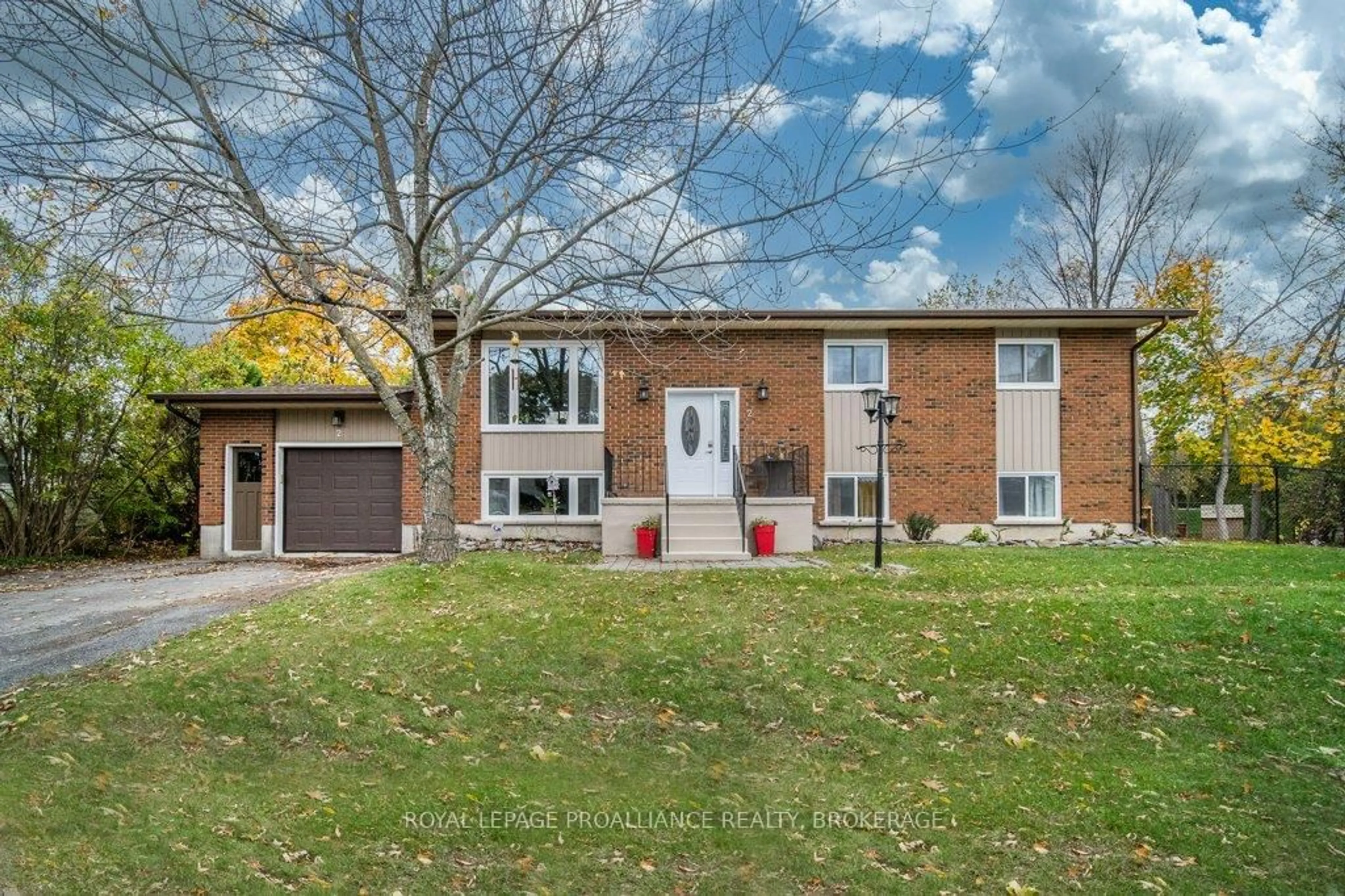 Home with brick exterior material, street for 2 Potter Dr, Bissett Creek Ontario K0H 2H0