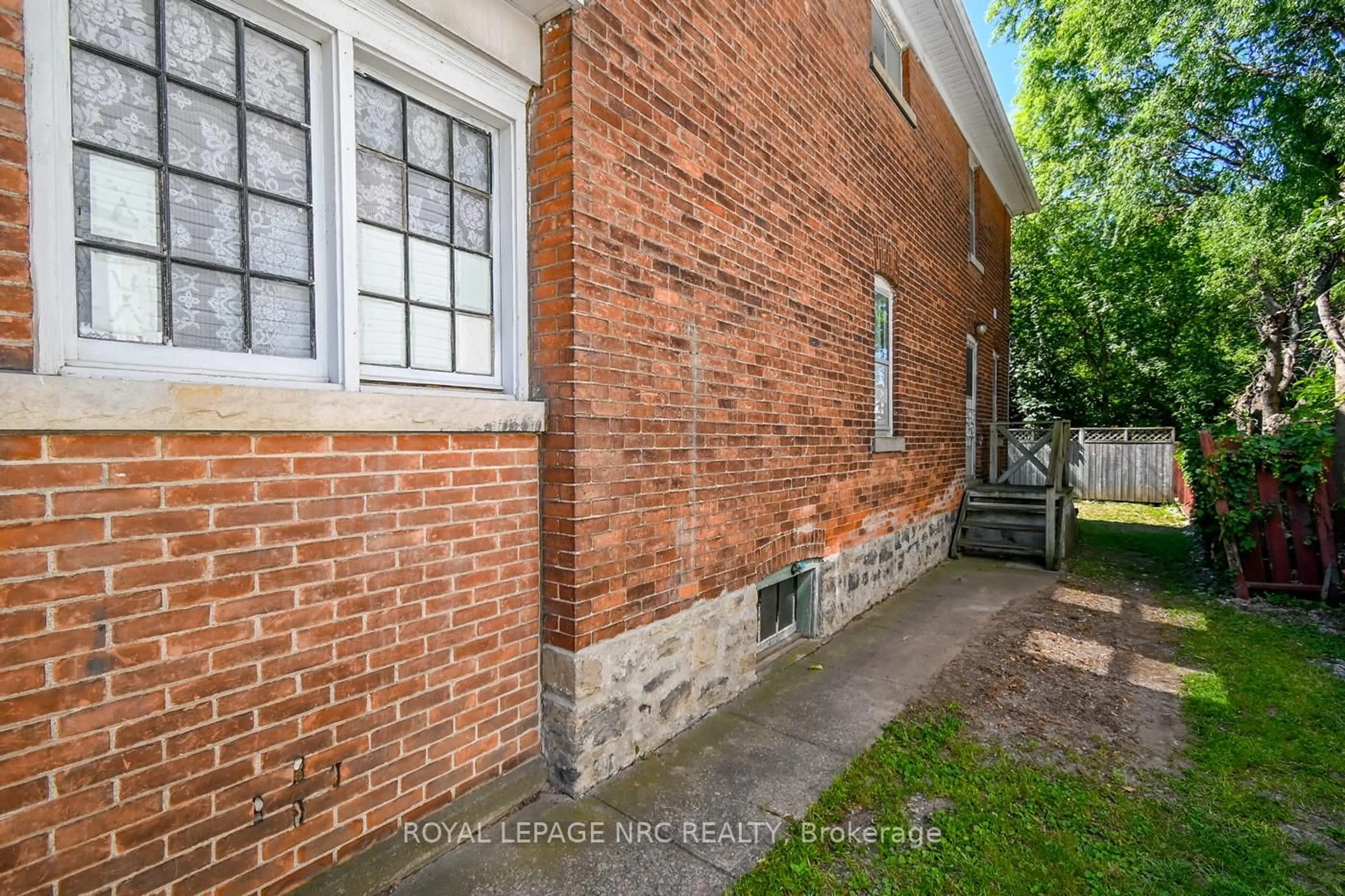 Home with brick exterior material, street for 105 Lake St, St. Catharines Ontario L2R 5X7