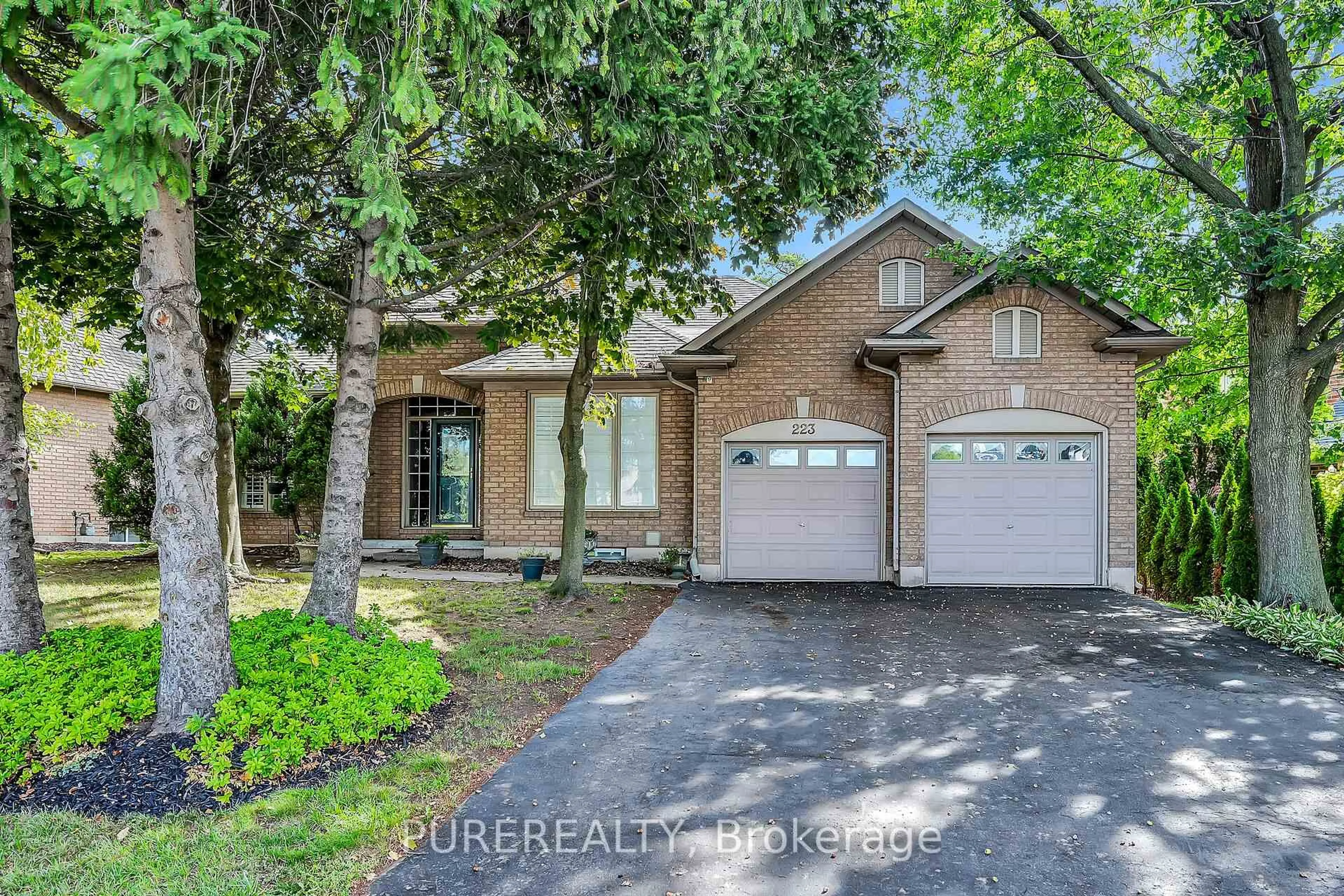 Home with brick exterior material, street for 223 Greenbriar Rd, Hamilton Ontario L9G 3V9