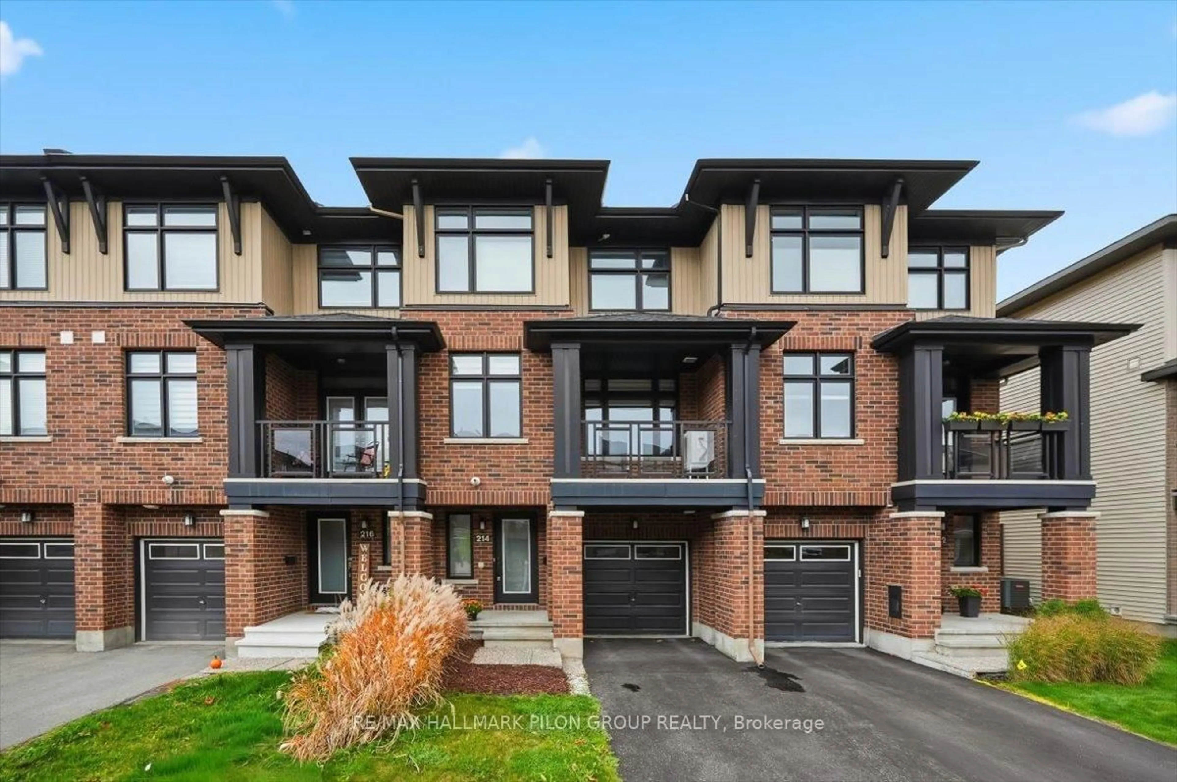 Home with brick exterior material, street for 214 Dragonfly Walk, Ottawa Ontario K1W 0J8