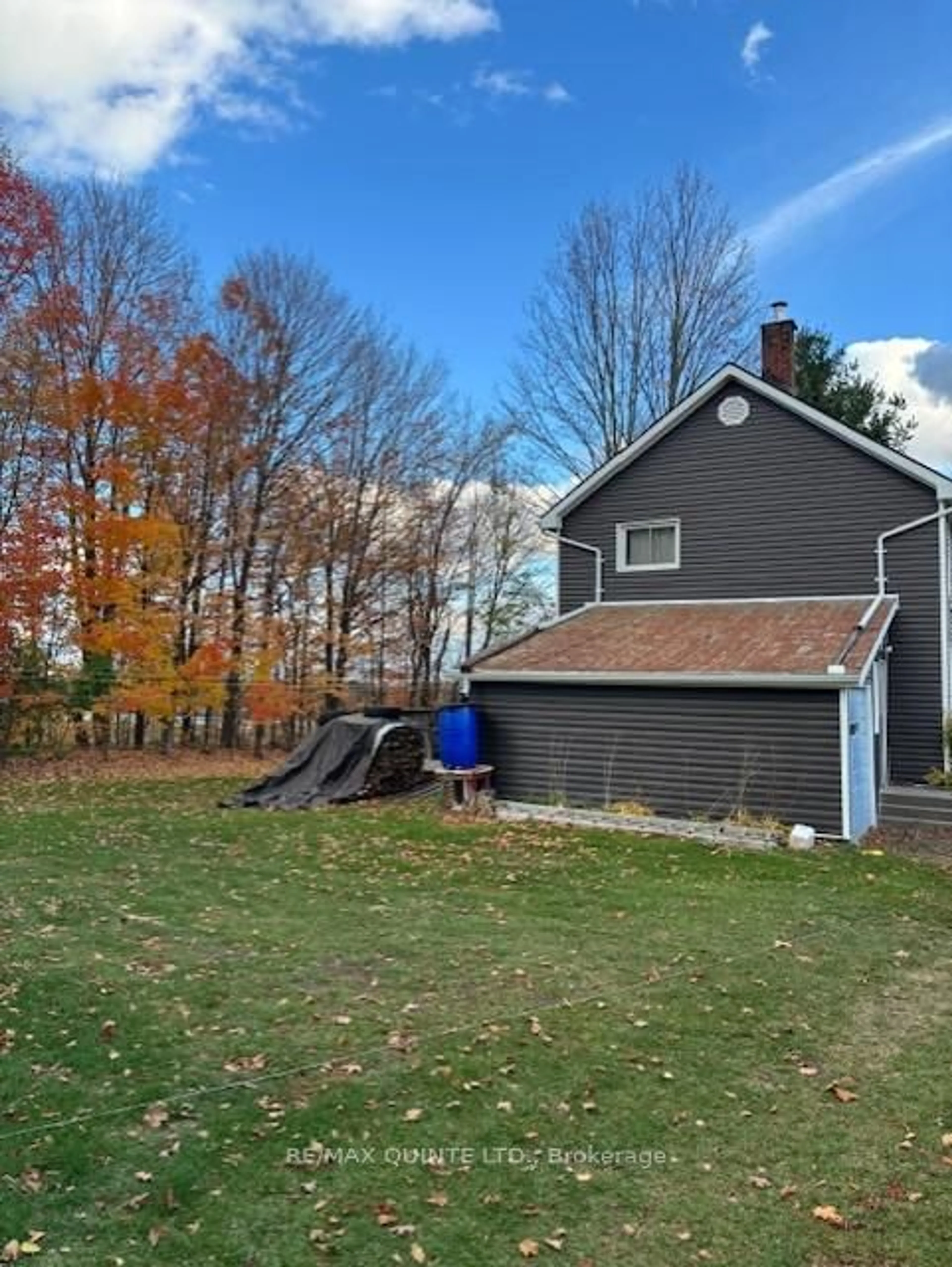 A pic from outside/outdoor area/front of a property/back of a property/a pic from drone, street for 1392 Queensborough Rd, Madoc Ontario K0K 2K0