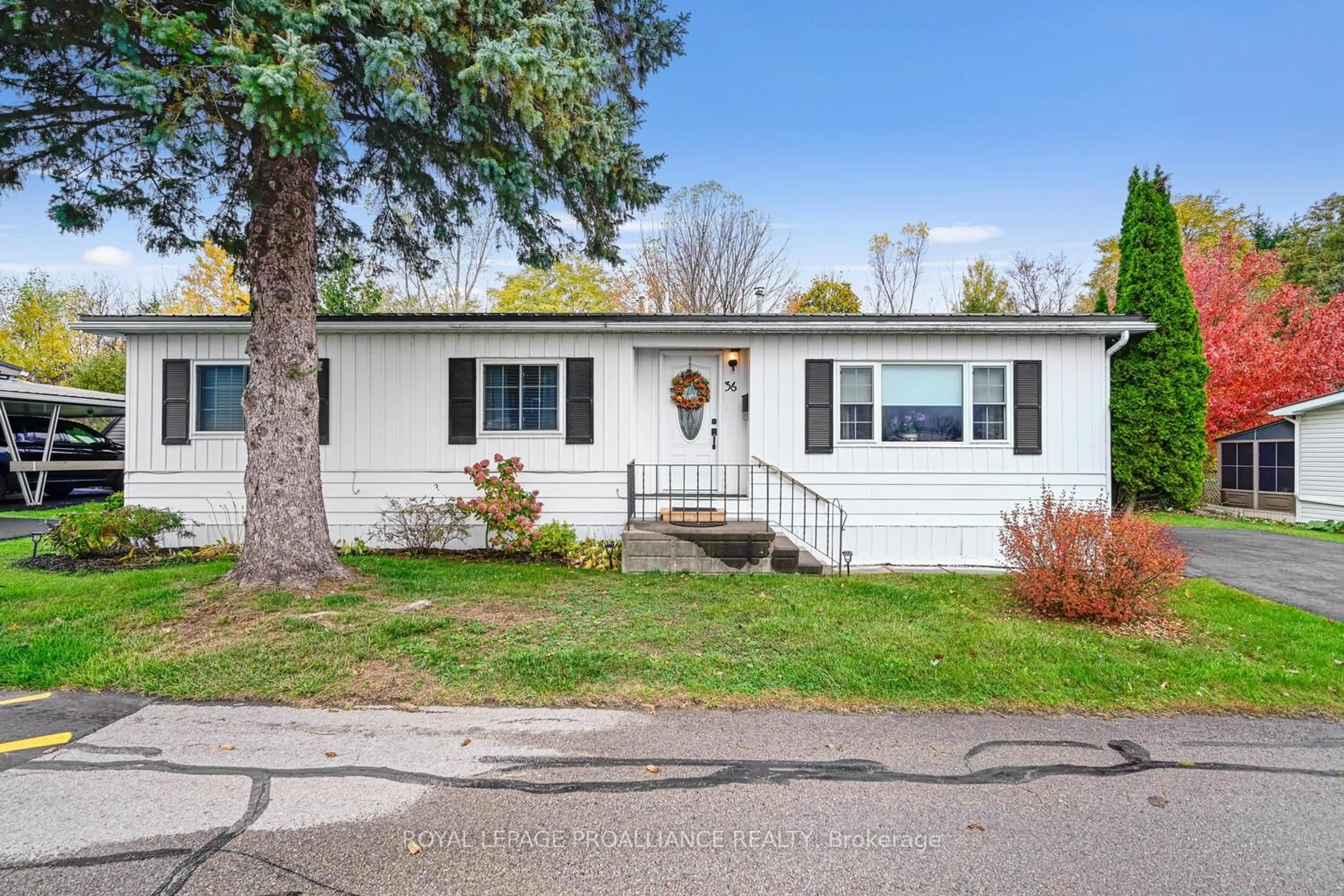 Home with vinyl exterior material, street for 1871 Oxford Ave #36, Elizabethtown-Kitley Ontario K6V 7B5