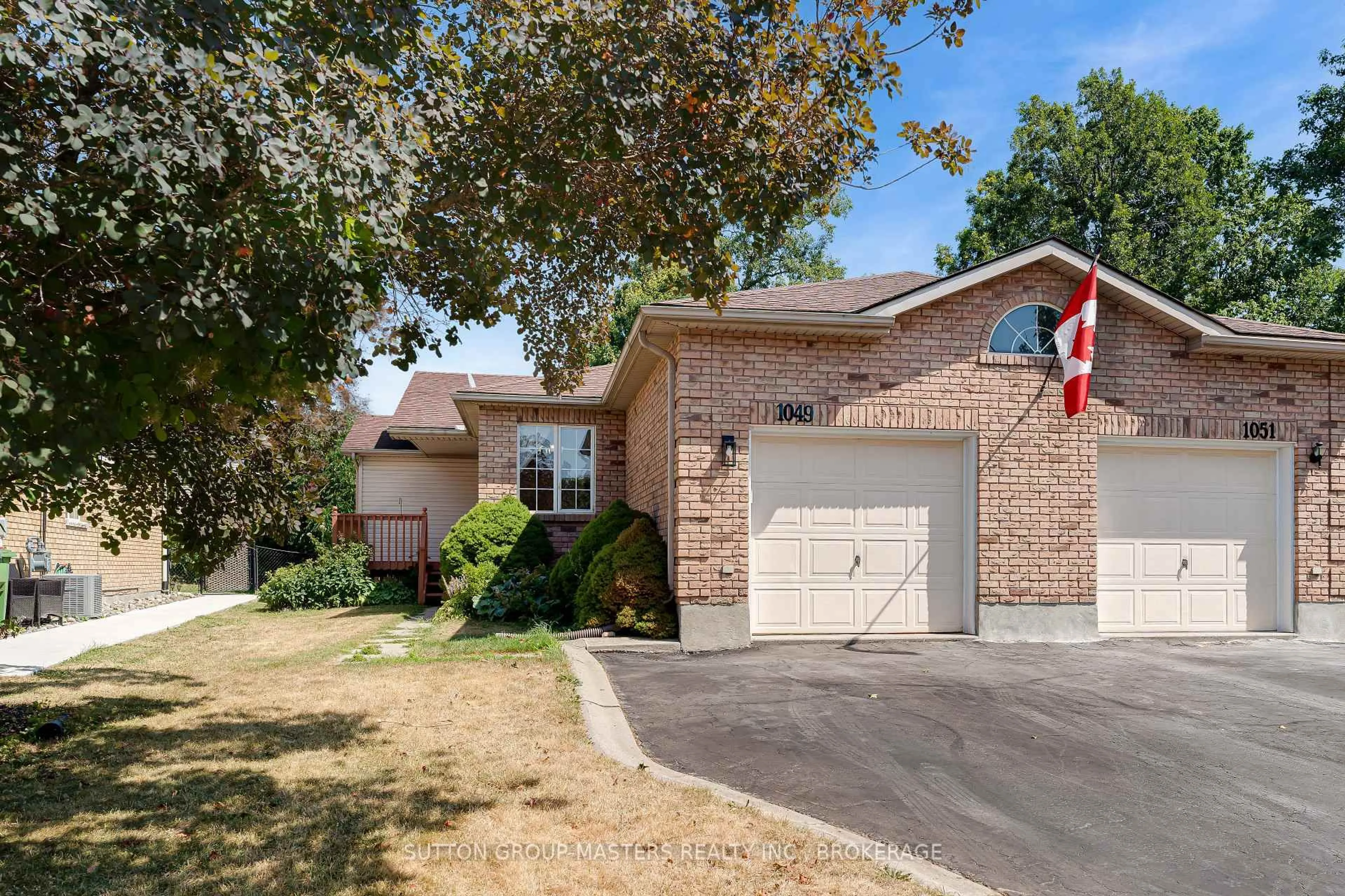 Home with brick exterior material, street for 1049 Waterbury Cres, Kingston Ontario K7M 8V4