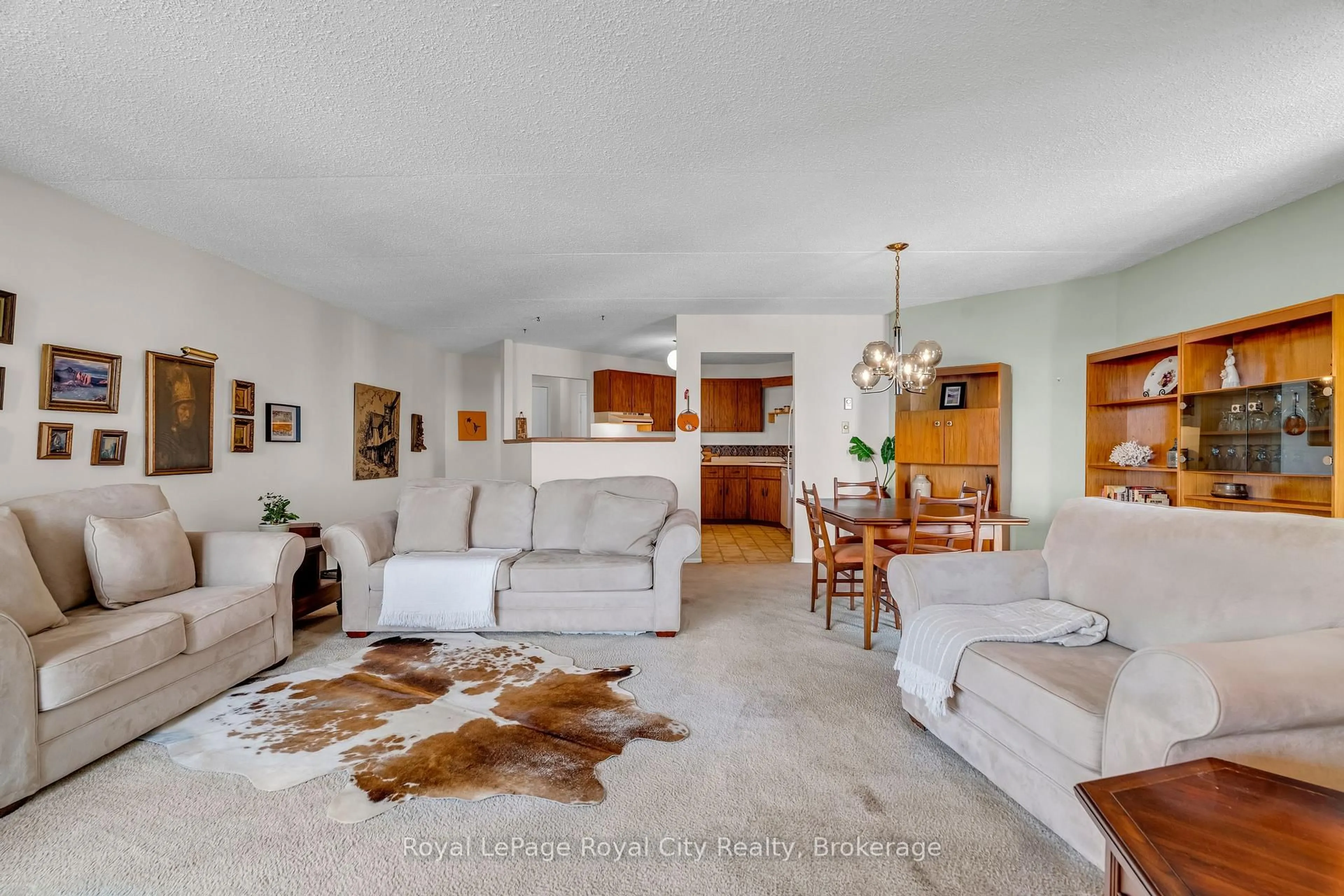 Living room with furniture, unknown for 22 Marilyn Dr #803, Guelph Ontario N1H 7T1