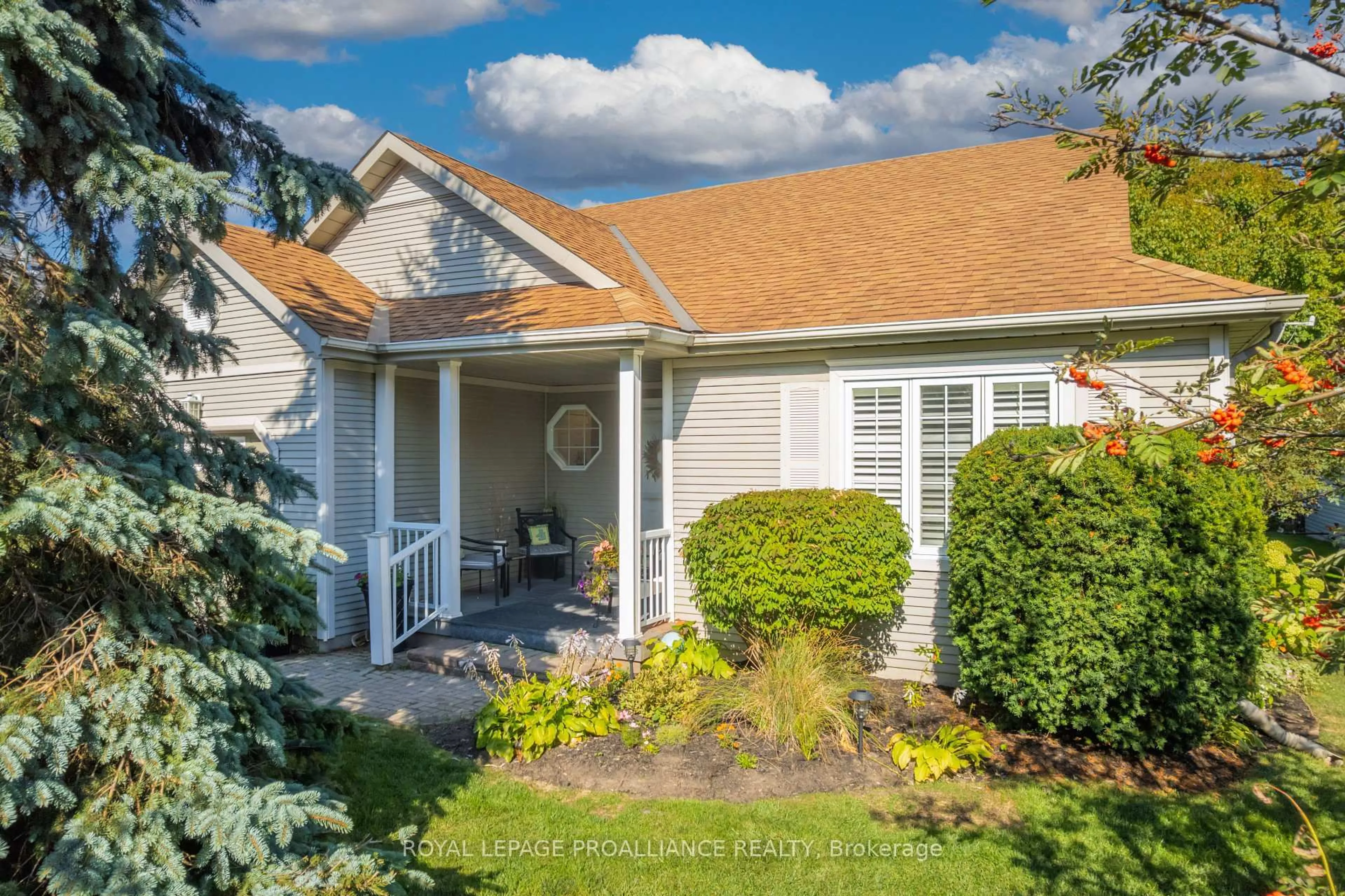 Home with vinyl exterior material, street for 25 Mills Rd, Brighton Ontario K0K 1H0