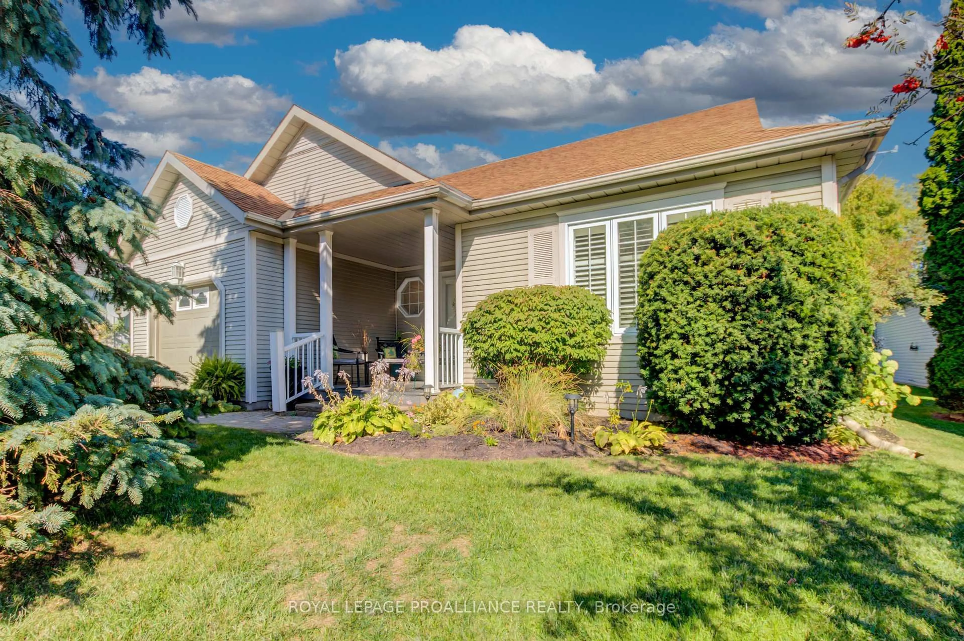 Home with vinyl exterior material, street for 25 Mills Rd, Brighton Ontario K0K 1H0