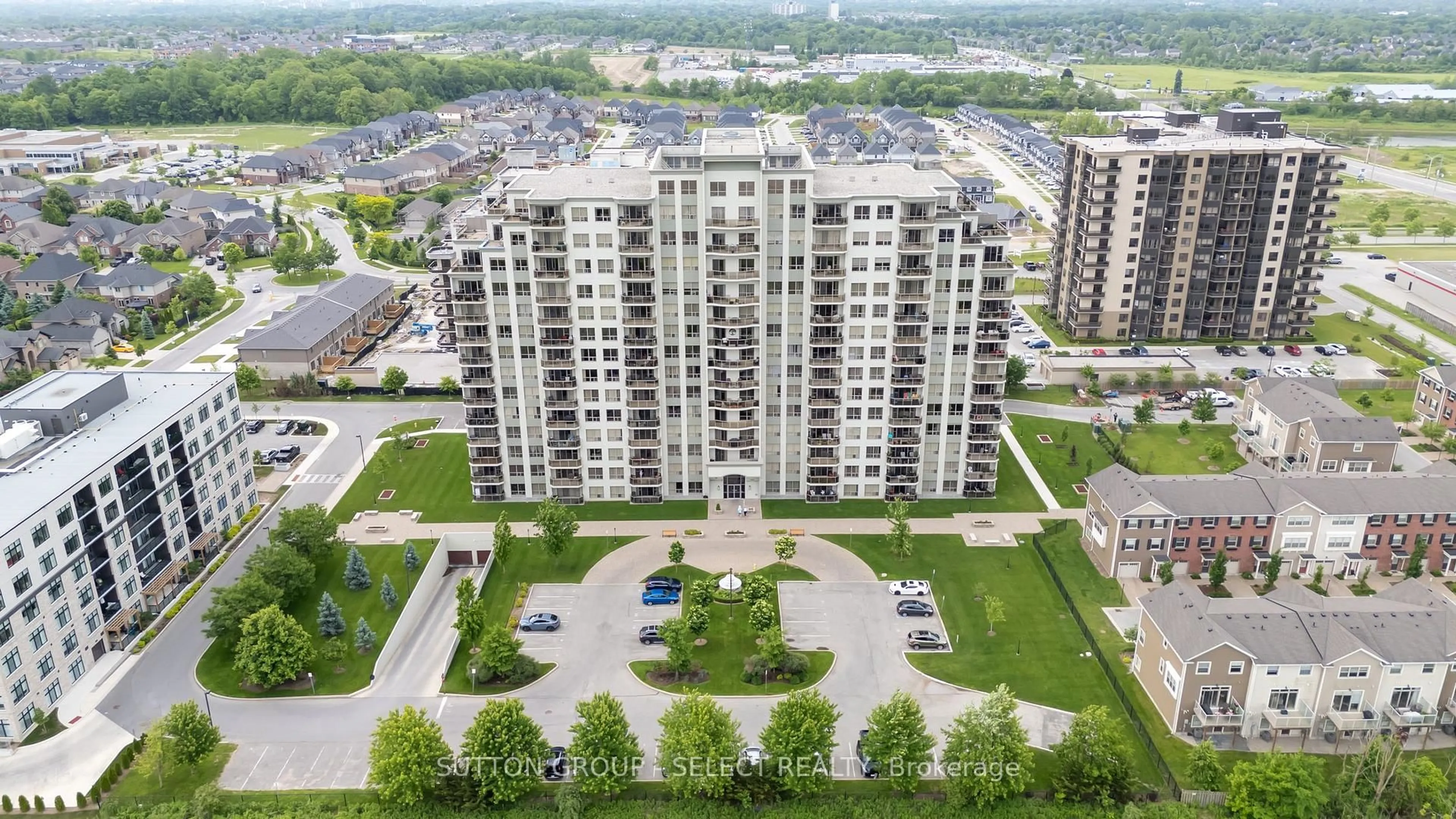 A pic from outside/outdoor area/front of a property/back of a property/a pic from drone, city buildings view from balcony for 1030 Coronation Dr #303, London North Ontario N6G 0G5