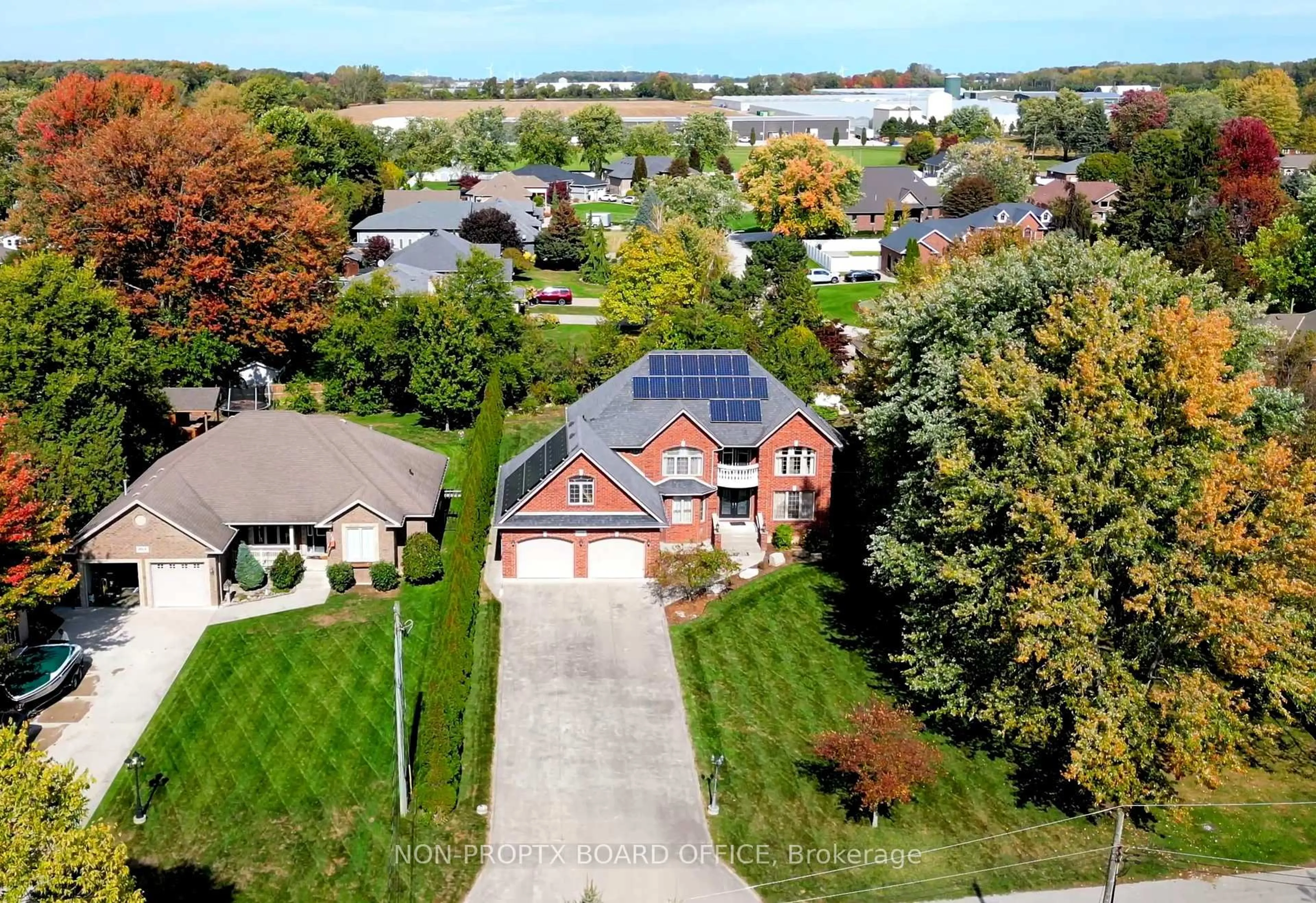 A pic from outside/outdoor area/front of a property/back of a property/a pic from drone, street for 870 McRae Ave, Kingsville Ontario N9Y 2R8