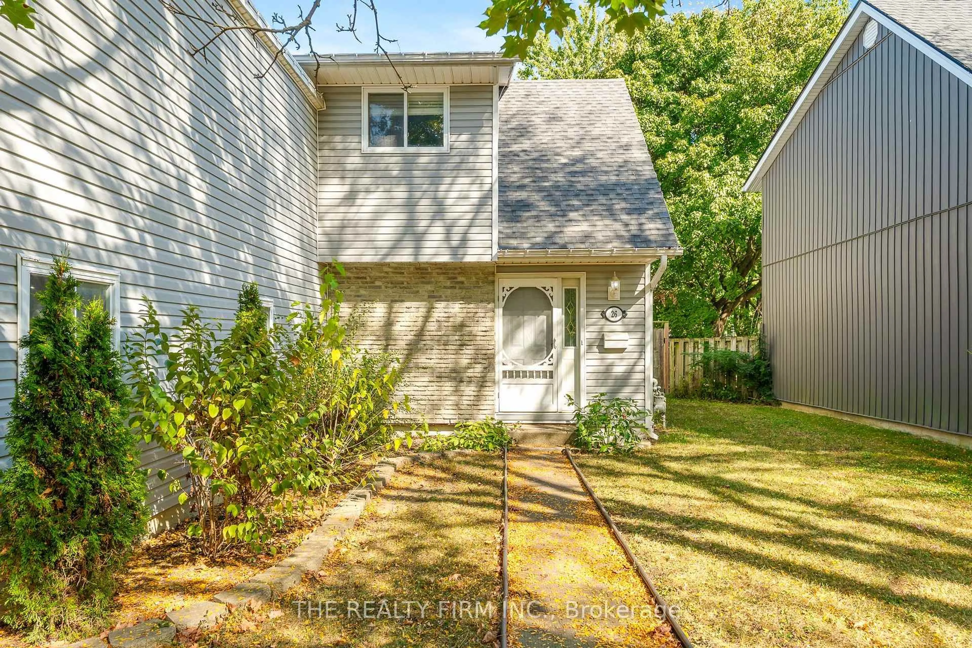 Home with vinyl exterior material, street for 26 Monmore Rd, London North Ontario N6G 2W6