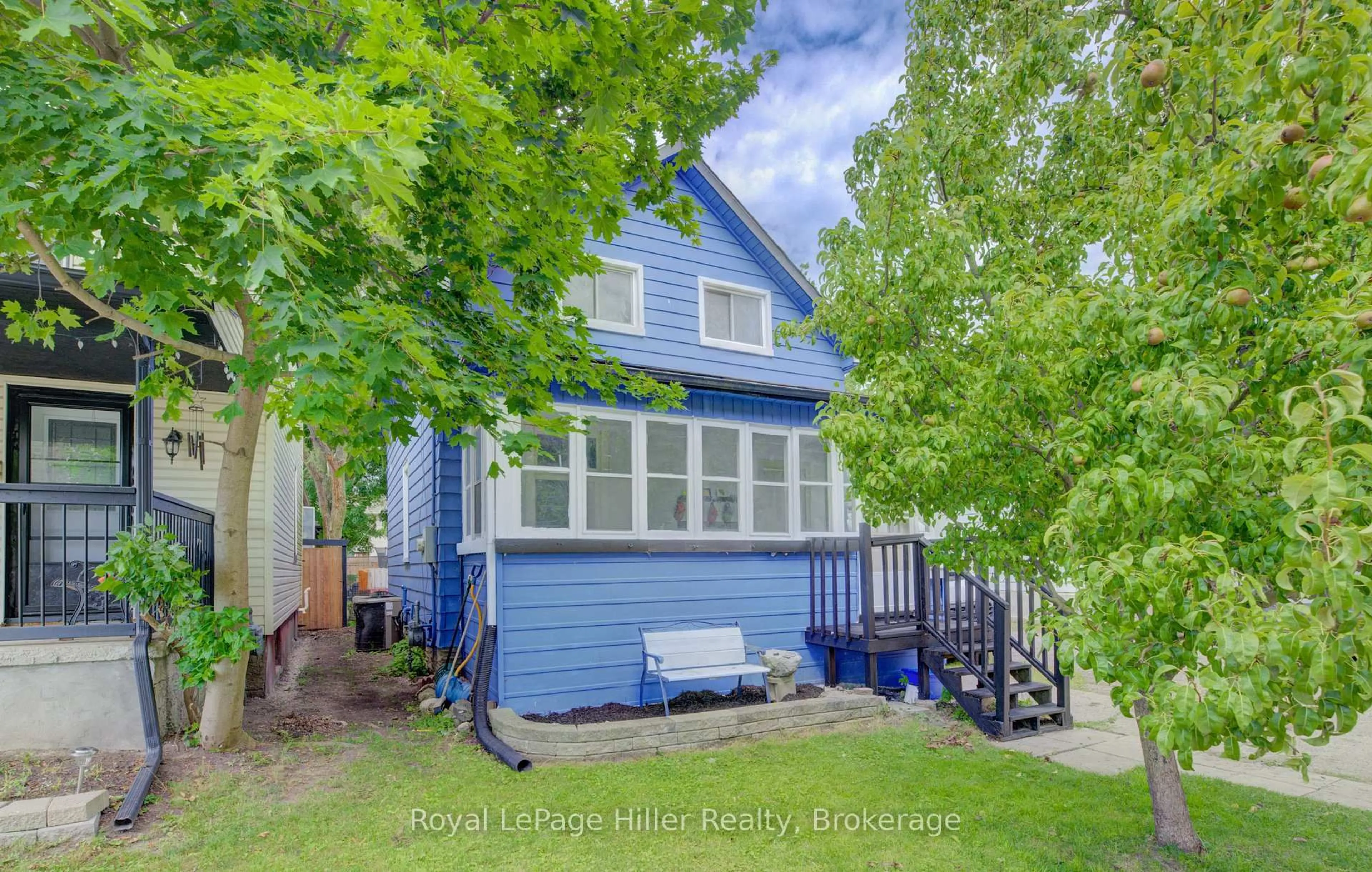 Home with vinyl exterior material, street for 104 Trinity St, Stratford Ontario N5A 4P6