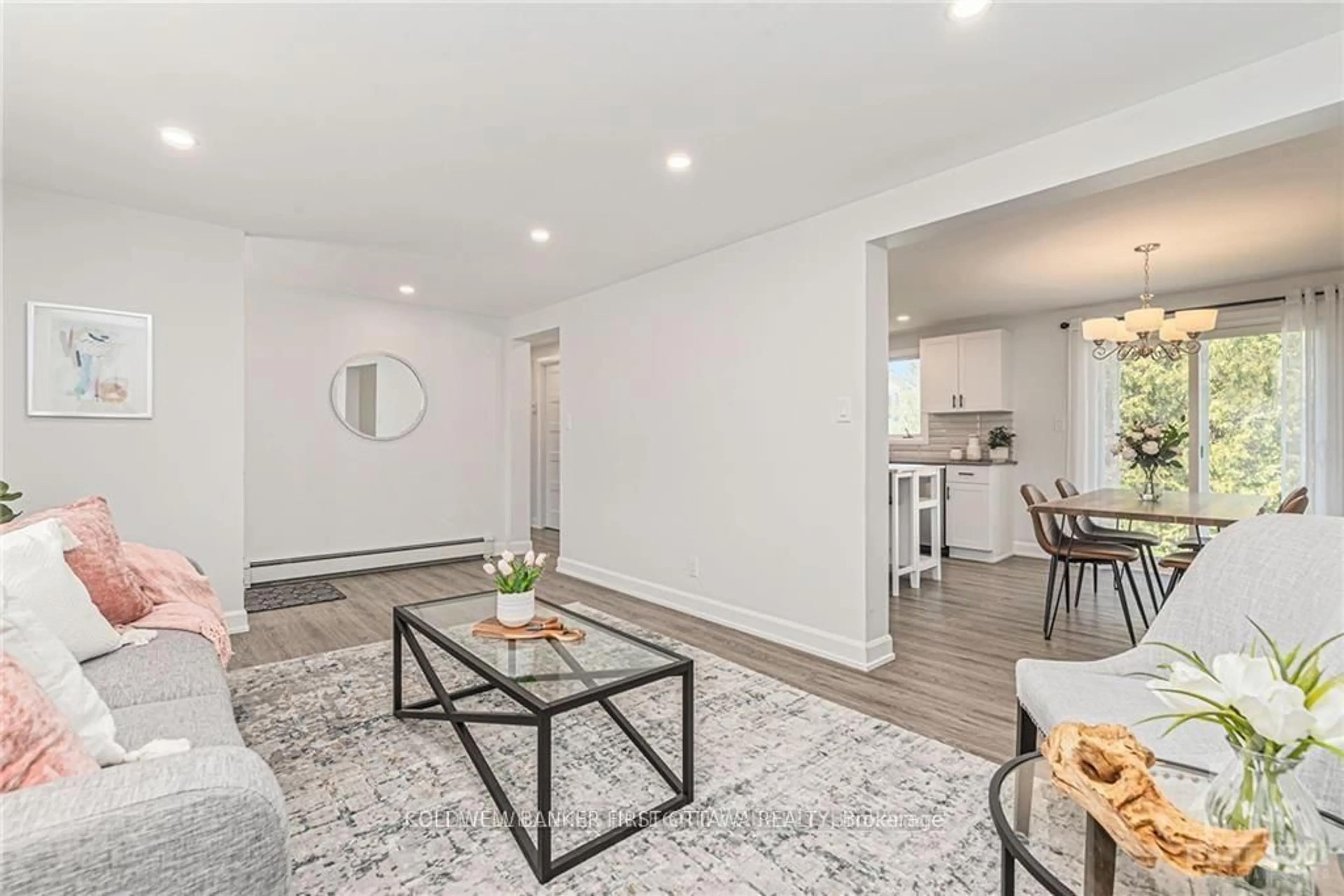 Living room with furniture, wood/laminate floor for 351 Amiens St, Ottawa Ontario K1E 1P1