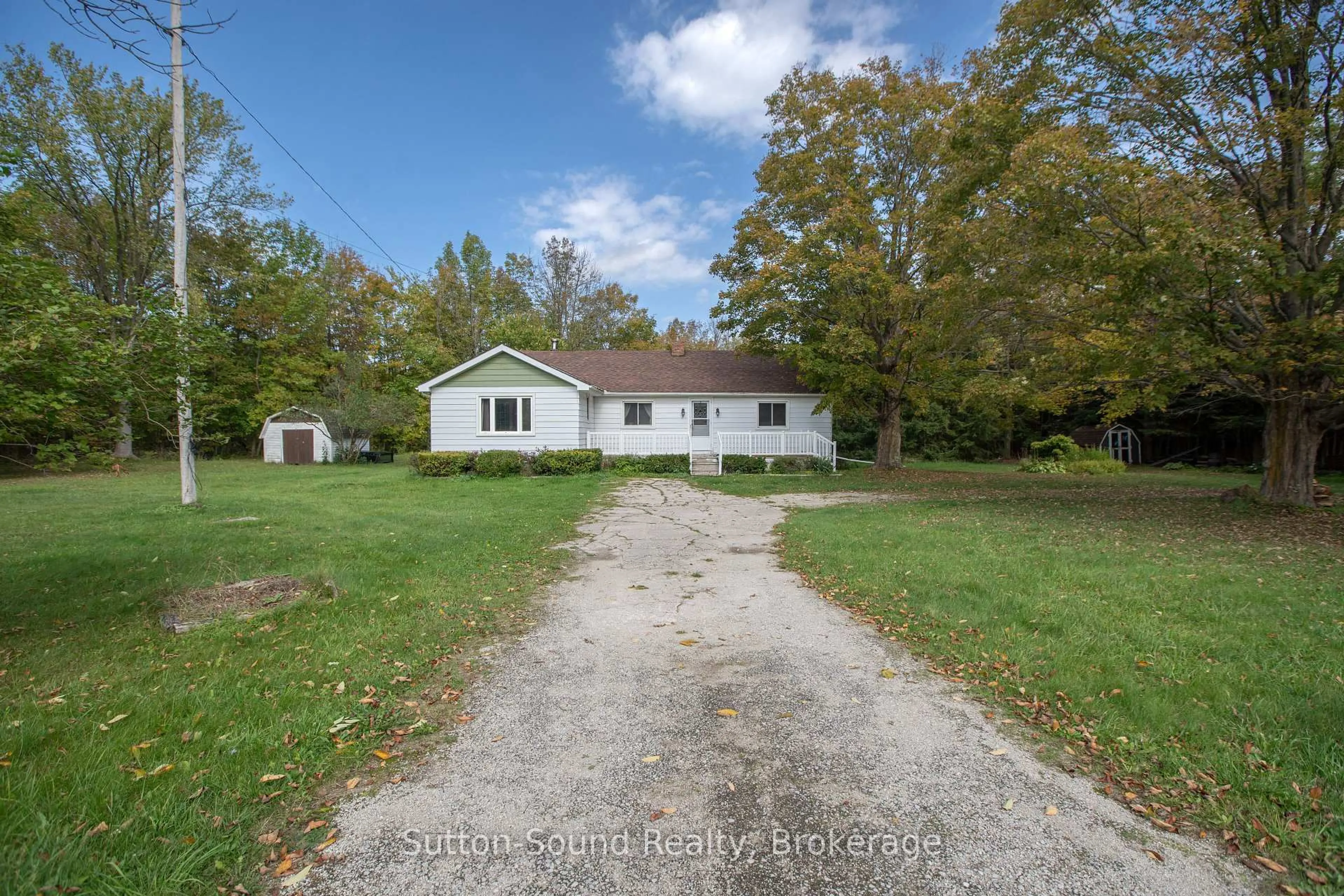 A pic from outside/outdoor area/front of a property/back of a property/a pic from drone, street for 204521 Highway 26, Meaford Ontario N4K 5W4