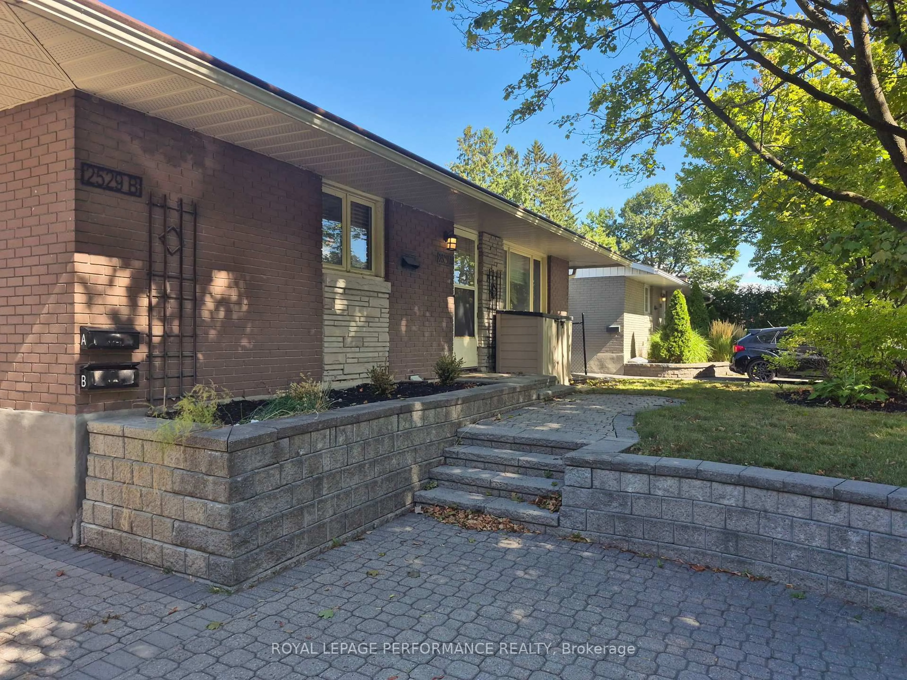 Home with brick exterior material, street for 2529 Roman Ave, Ottawa Ontario K2B 7X8