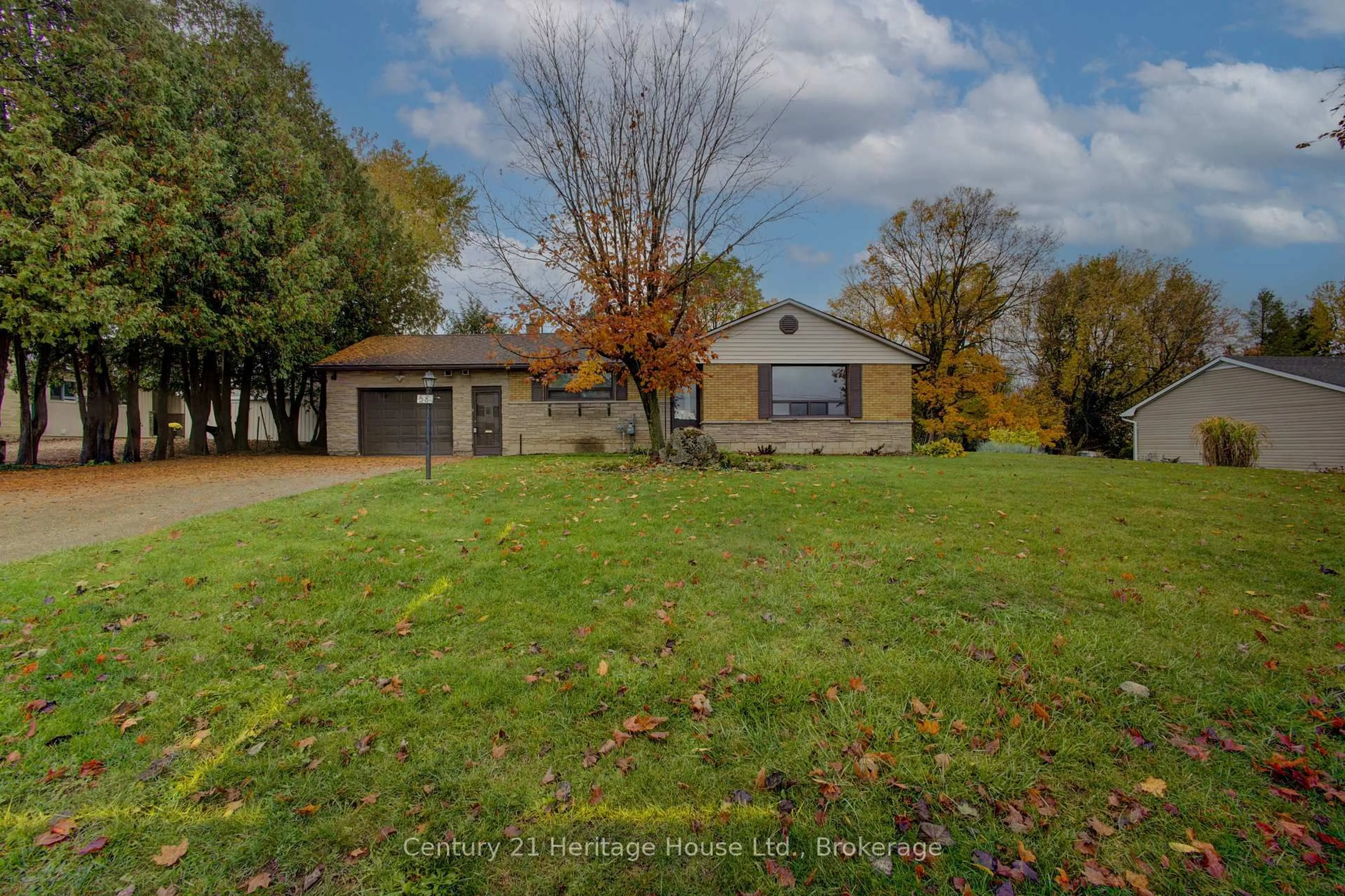 A pic from outside/outdoor area/front of a property/back of a property/a pic from drone, unknown for 58 Allan St, Minto Ontario N0G 1M0