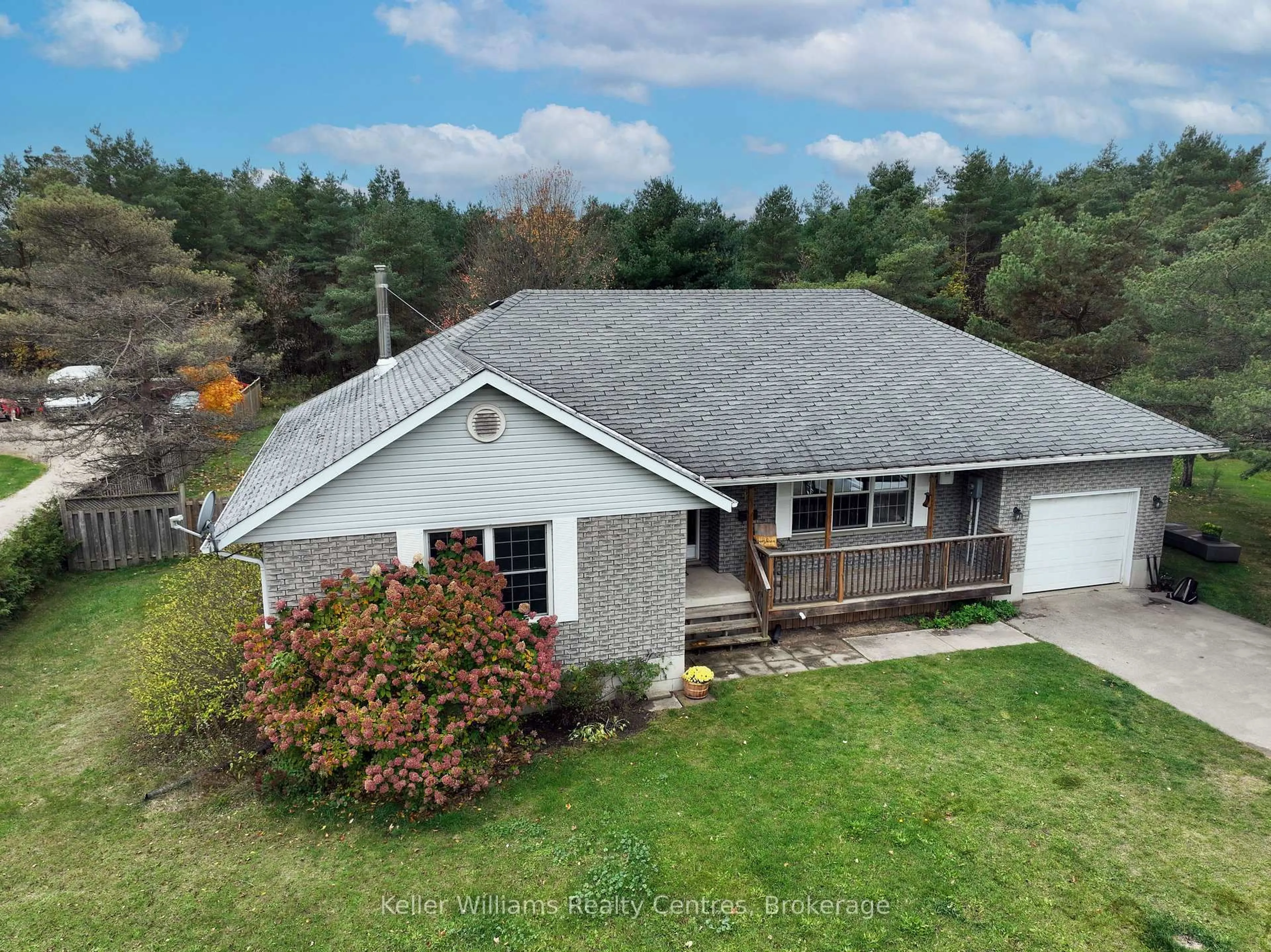 A pic from outside/outdoor area/front of a property/back of a property/a pic from drone, unknown for 12 Pine Tree Dr, South Bruce Peninsula Ontario N0H 2T0