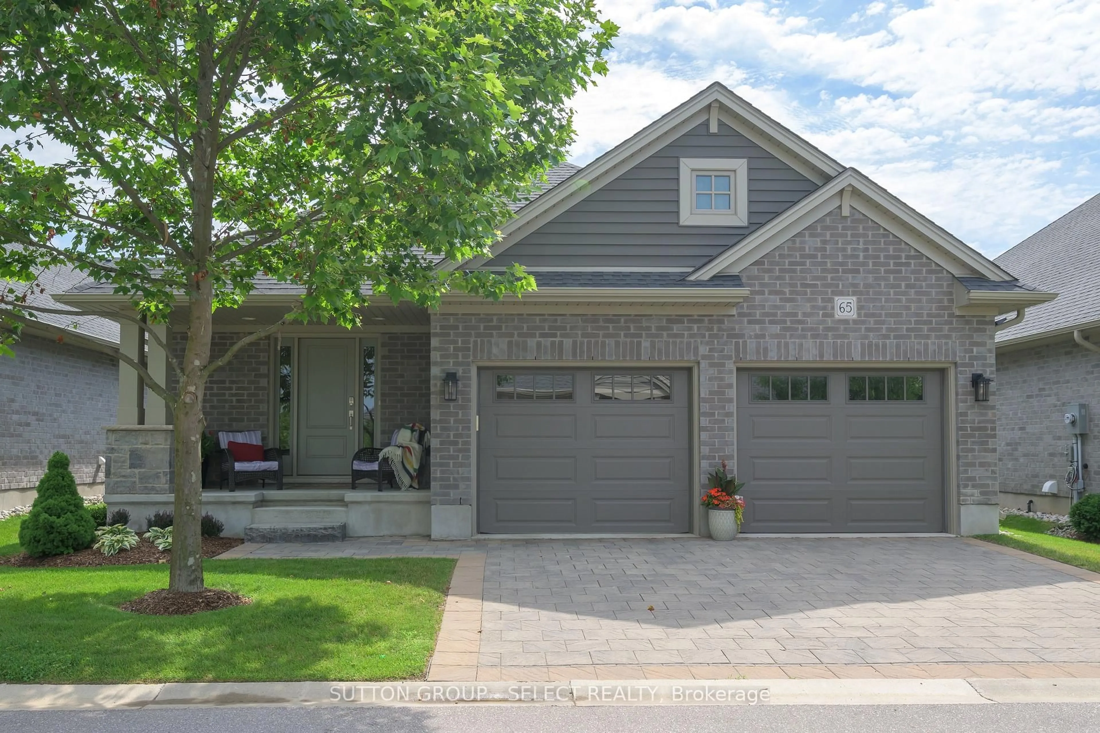 Home with brick exterior material, street for 234 Peach Tree Blvd #65, St. Thomas Ontario N5R 0G8