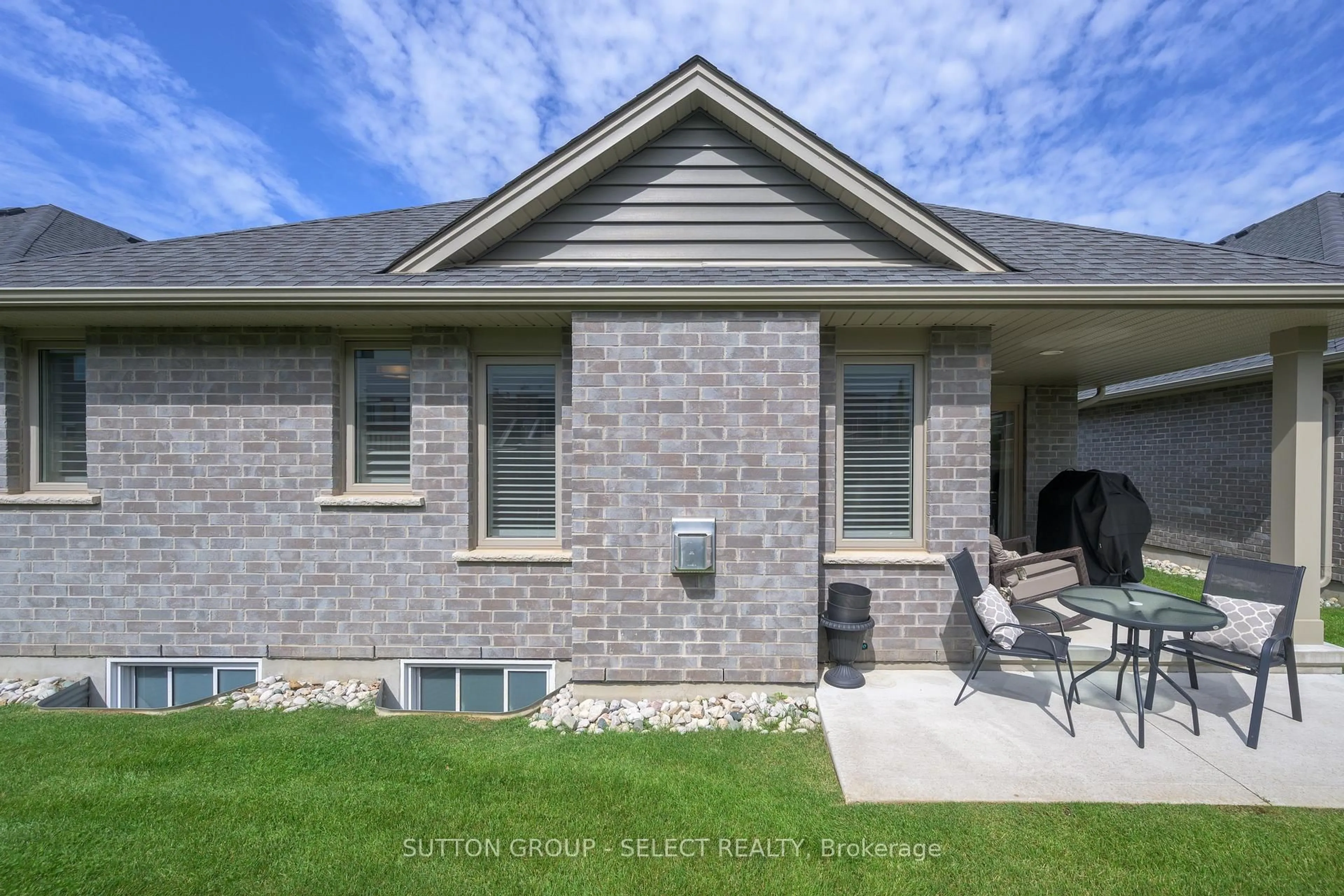 Home with brick exterior material, street for 234 Peach Tree Blvd #65, St. Thomas Ontario N5R 0G8