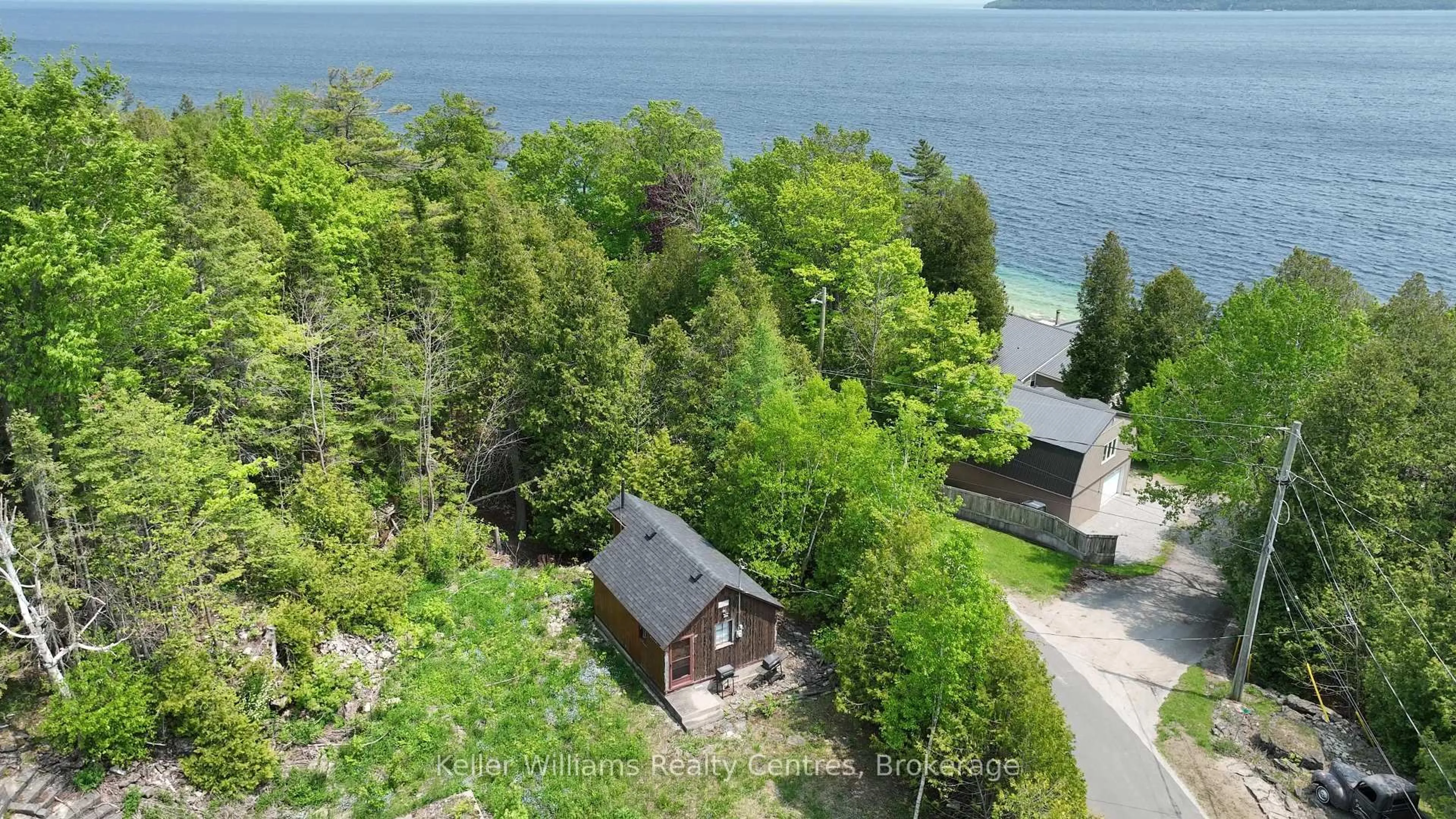 A pic from outside/outdoor area/front of a property/back of a property/a pic from drone, water/lake/river/ocean view for 79 Whippoorwill Rd, Northern Bruce Peninsula Ontario N0H 1W0