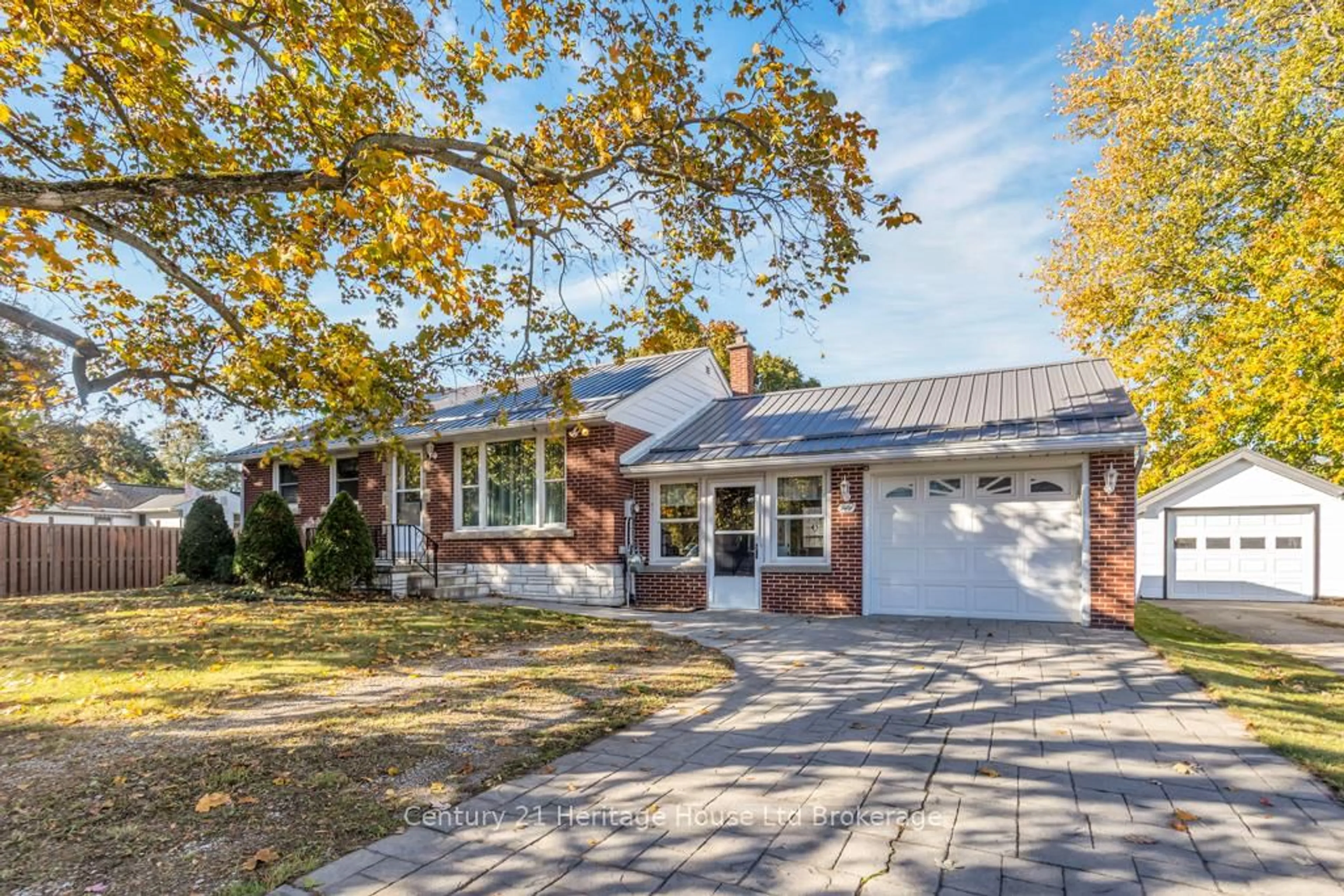 Home with brick exterior material, street for 50 MacHenry St, Lambton Shores Ontario N0N 1J0