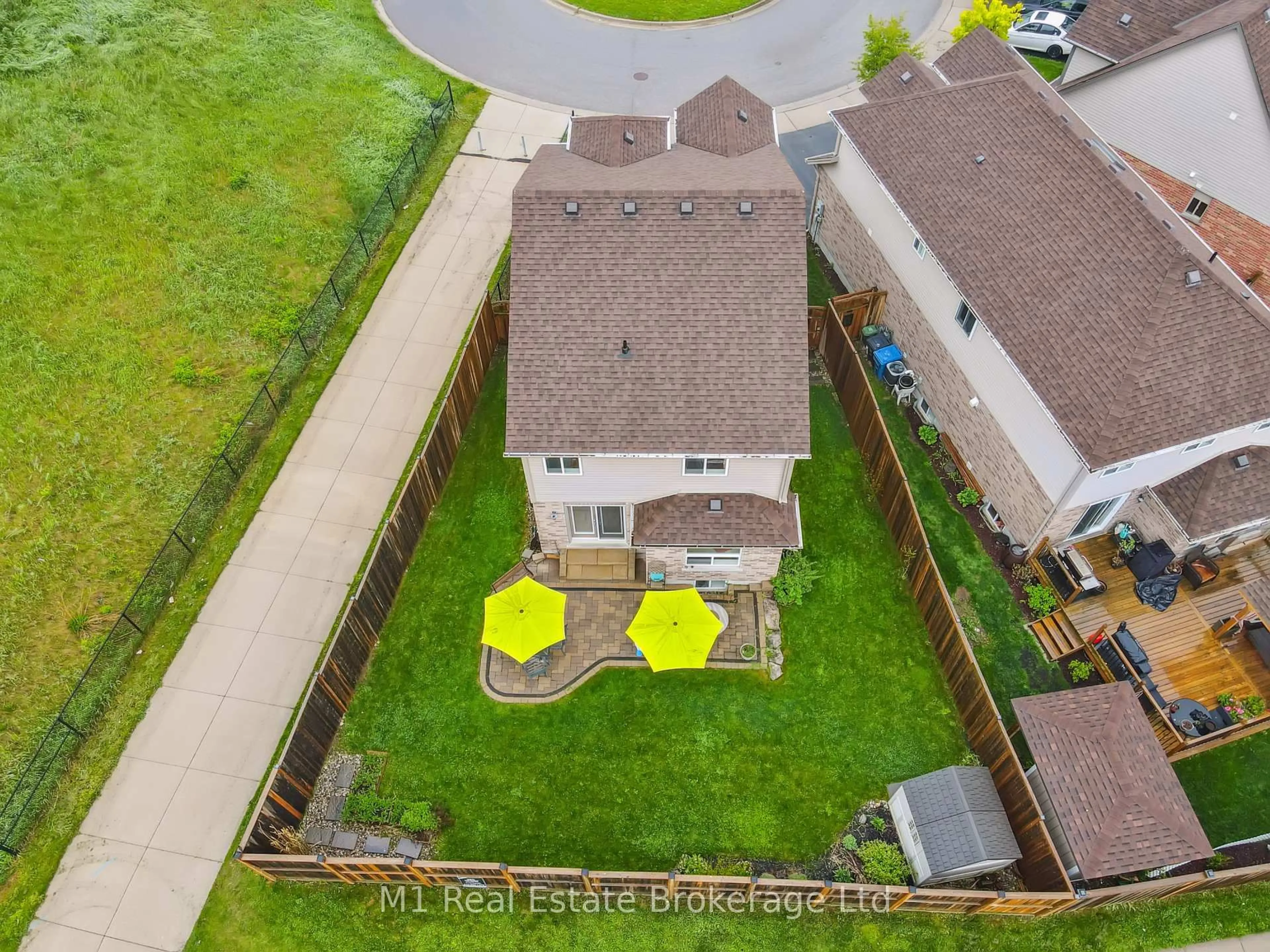 A pic from outside/outdoor area/front of a property/back of a property/a pic from drone, unknown for 12 Oakes Crt, Guelph Ontario N1E 0J6