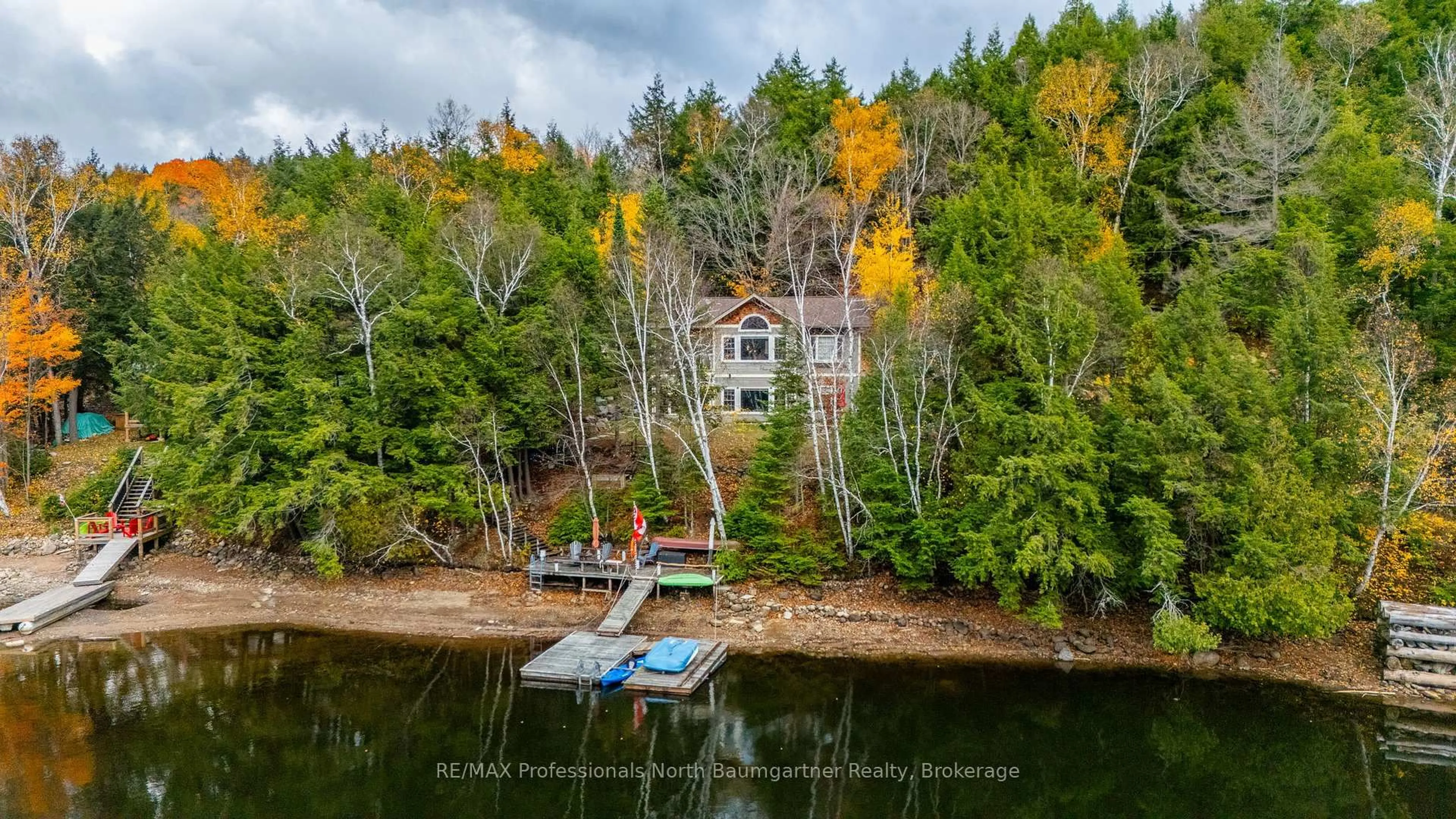 A pic from outside/outdoor area/front of a property/back of a property/a pic from drone, water/lake/river/ocean view for 1014 Aztec Tr, Dysart et al Ontario K0M 1S0