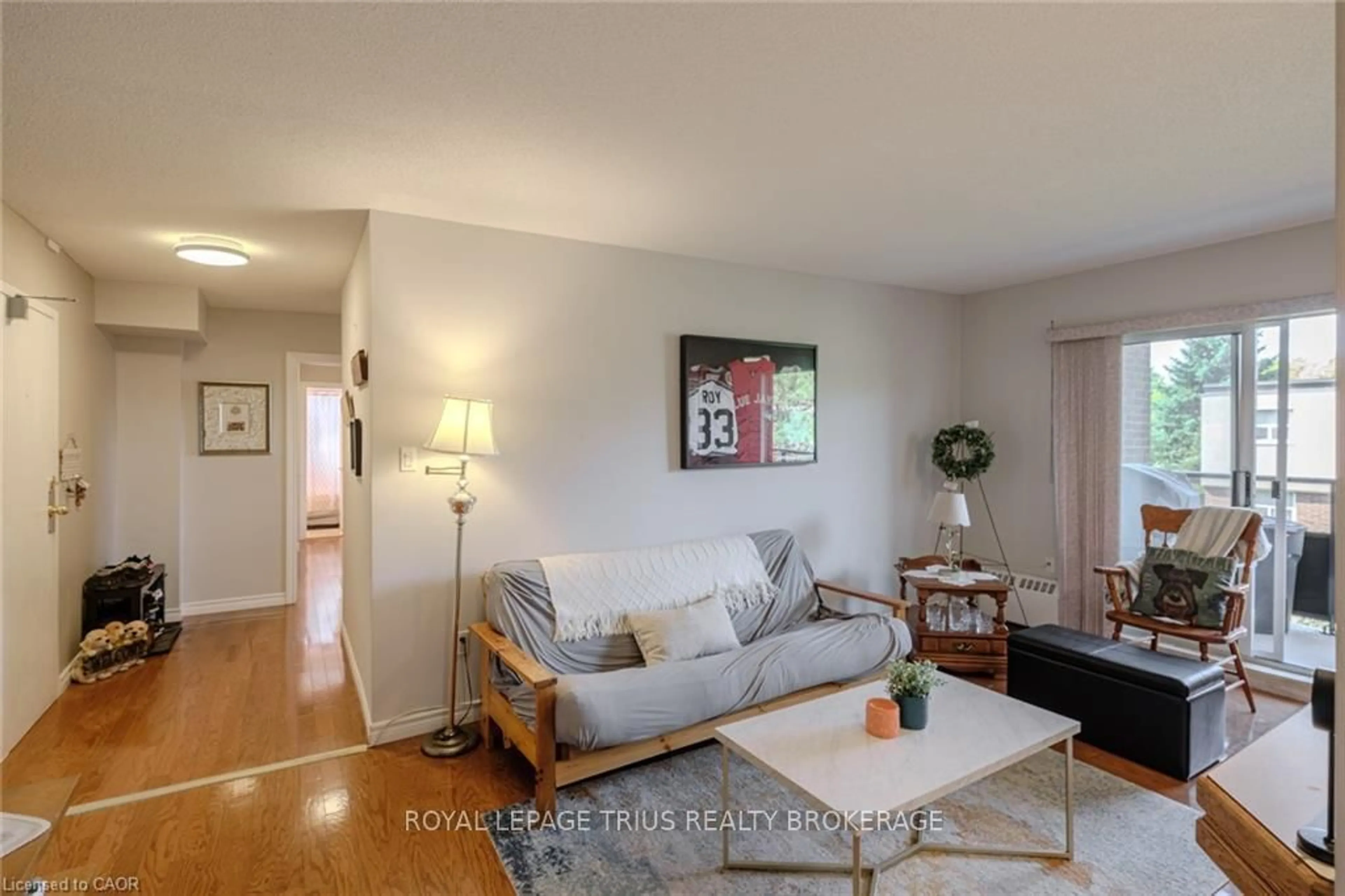 Living room with furniture, unknown for 648 Grey St #308, Brantford Ontario N3S 4Y3