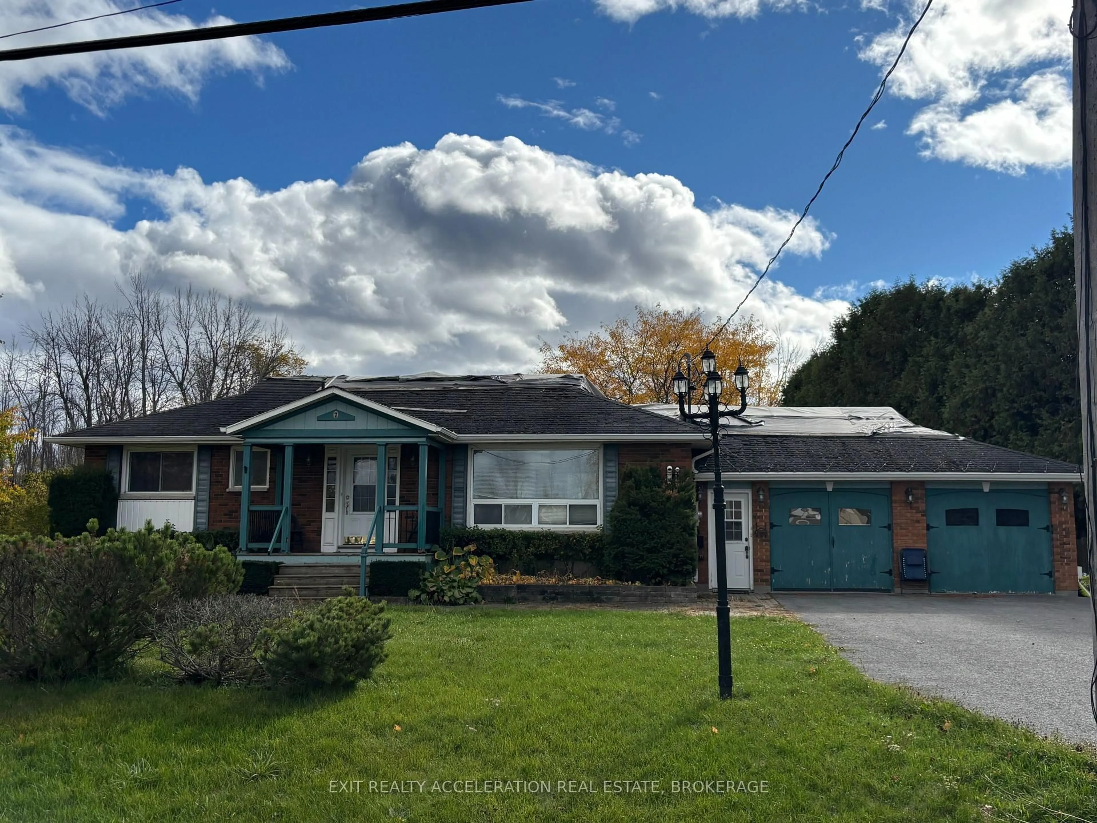 A pic from outside/outdoor area/front of a property/back of a property/a pic from drone, street for 7 Main St, Bissett Creek Ontario K0H 2H0