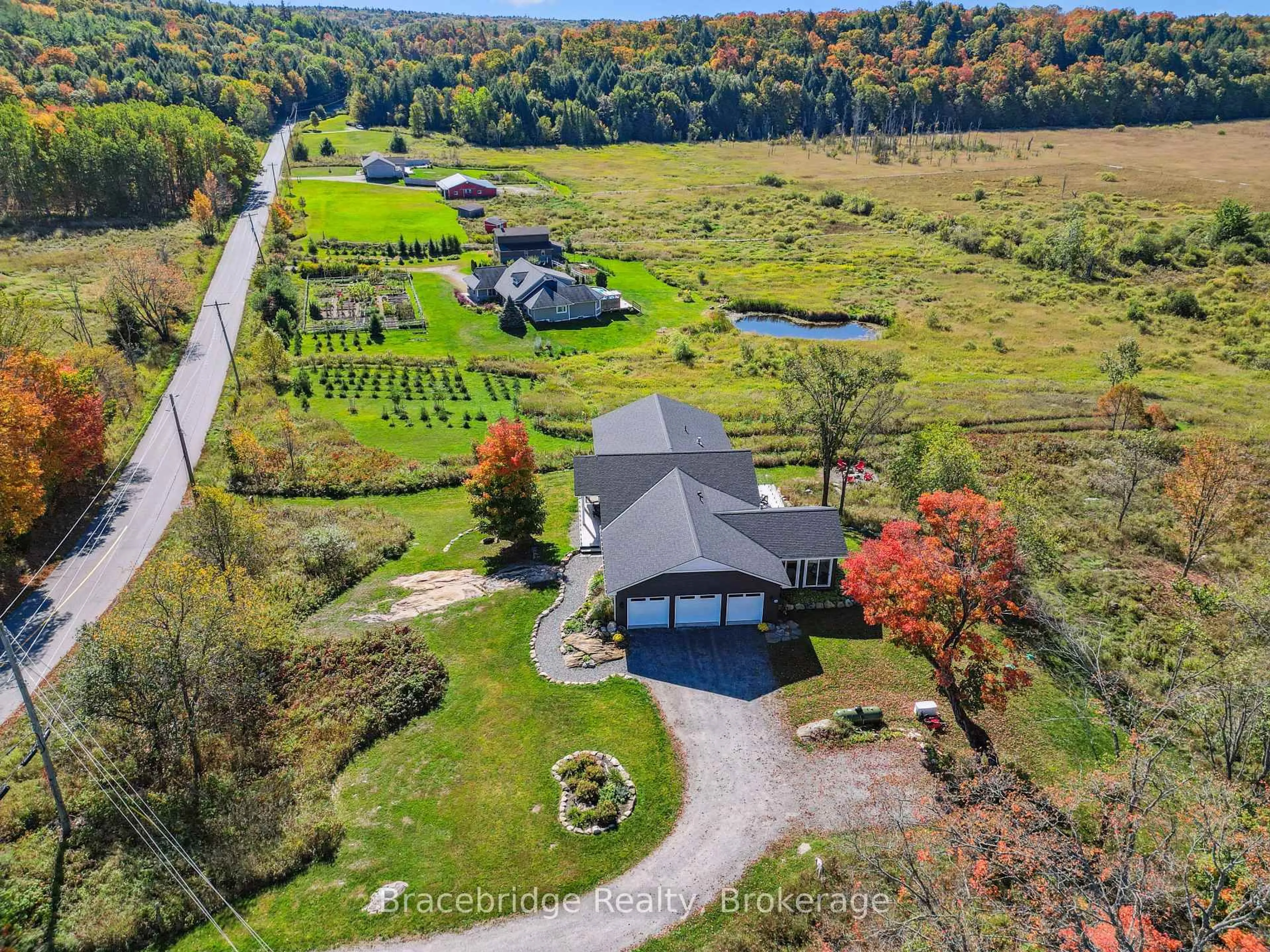 A pic from outside/outdoor area/front of a property/back of a property/a pic from drone, water/lake/river/ocean view for 1006 Stephens Bay Rd, Bracebridge Ontario P1L 1X2