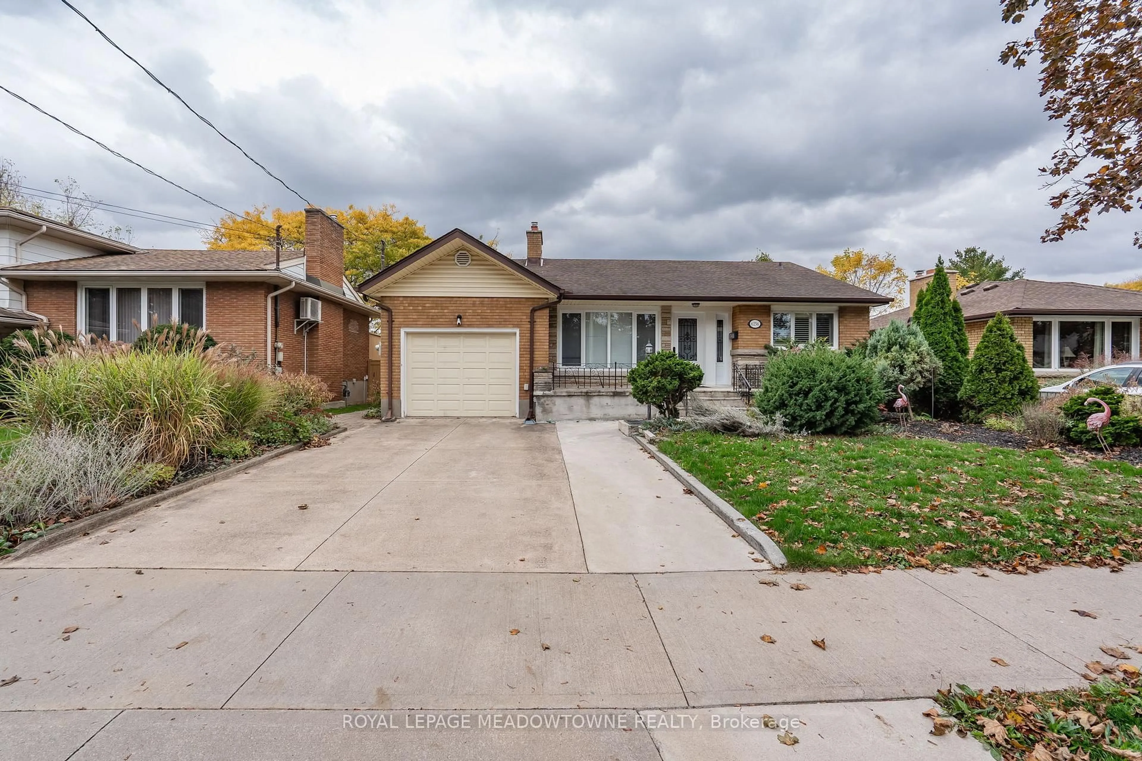 Home with brick exterior material, street for 6256 Balmoral Ave, Niagara Falls Ontario L2E 3A6