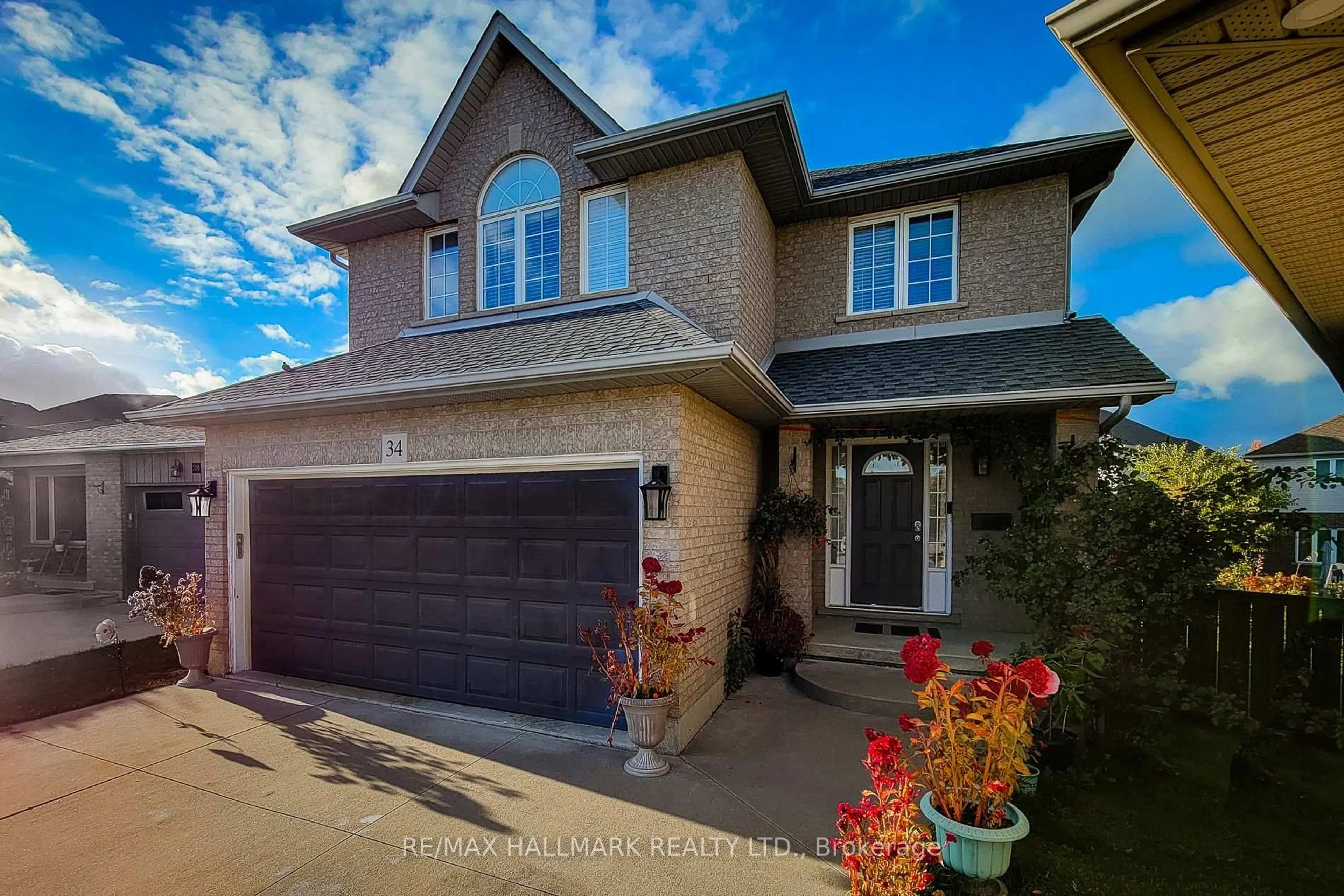 Home with brick exterior material, street for 34 Marilyn Crt, Hamilton Ontario L9B 2T5