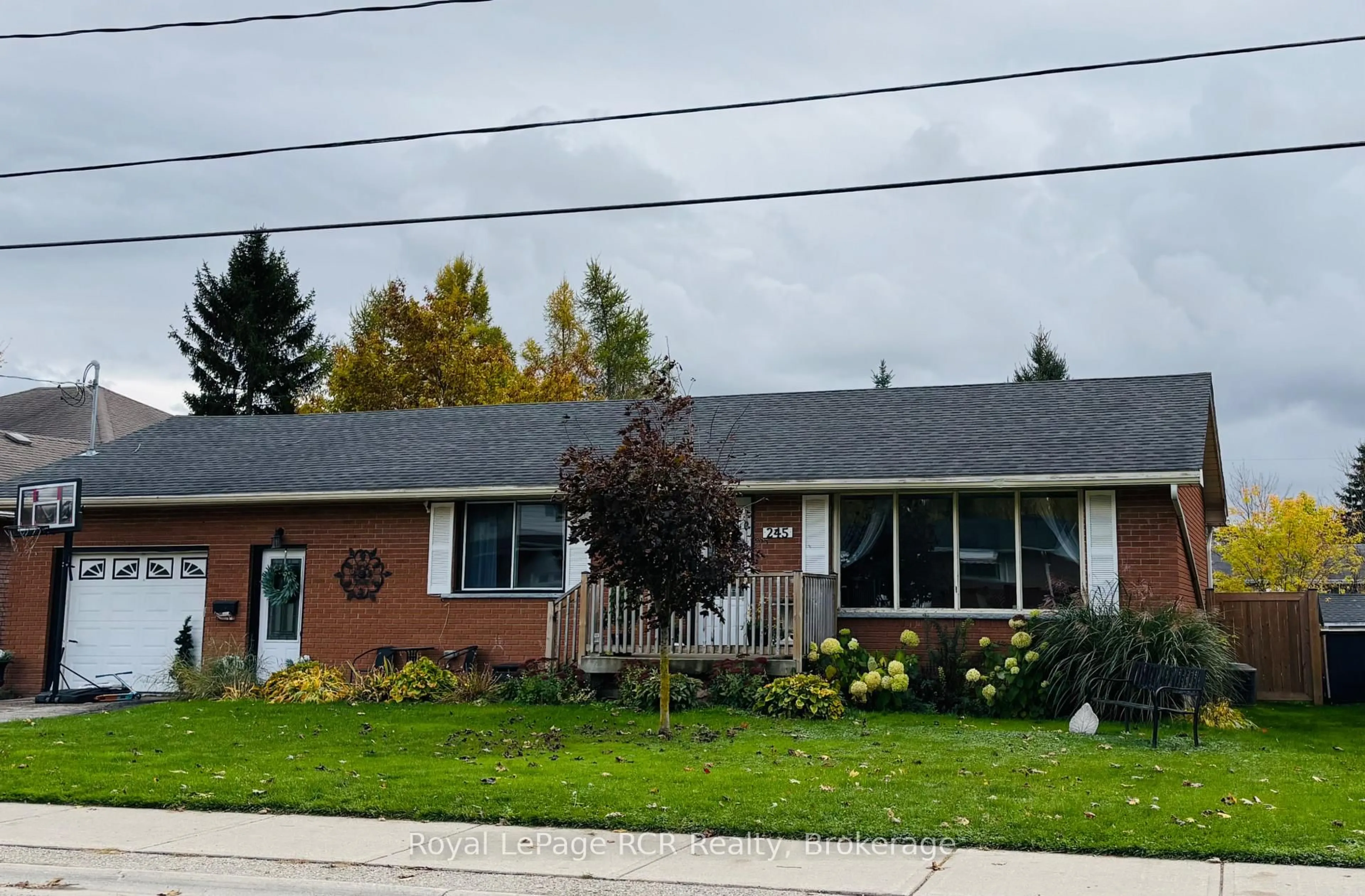 Home with vinyl exterior material, street for 245 Domville St, Wellington North Ontario N0G 1A0