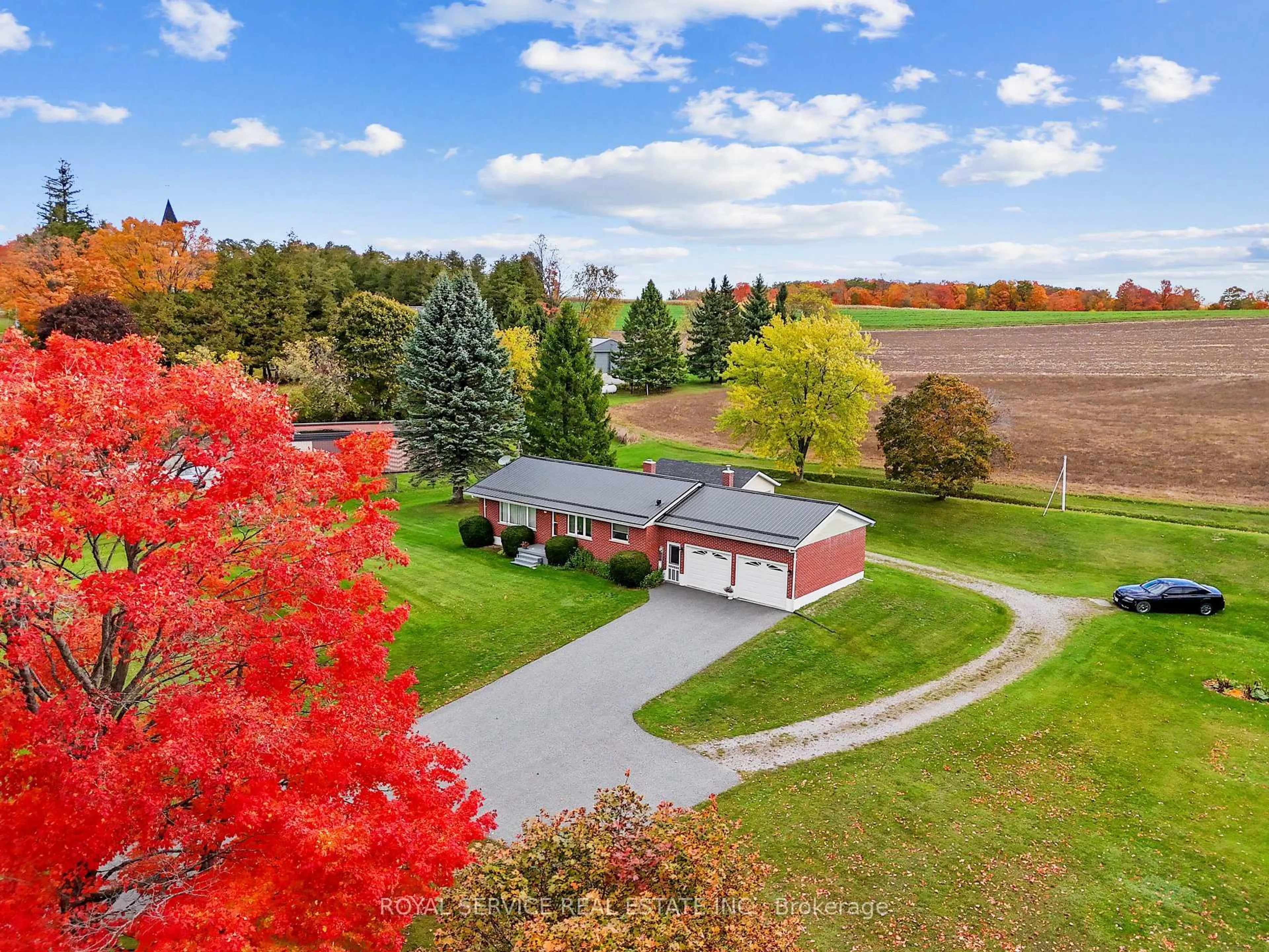 A pic from outside/outdoor area/front of a property/back of a property/a pic from drone, mountain view for 3879 Burnham St, Hamilton Township Ontario K9A 4J9
