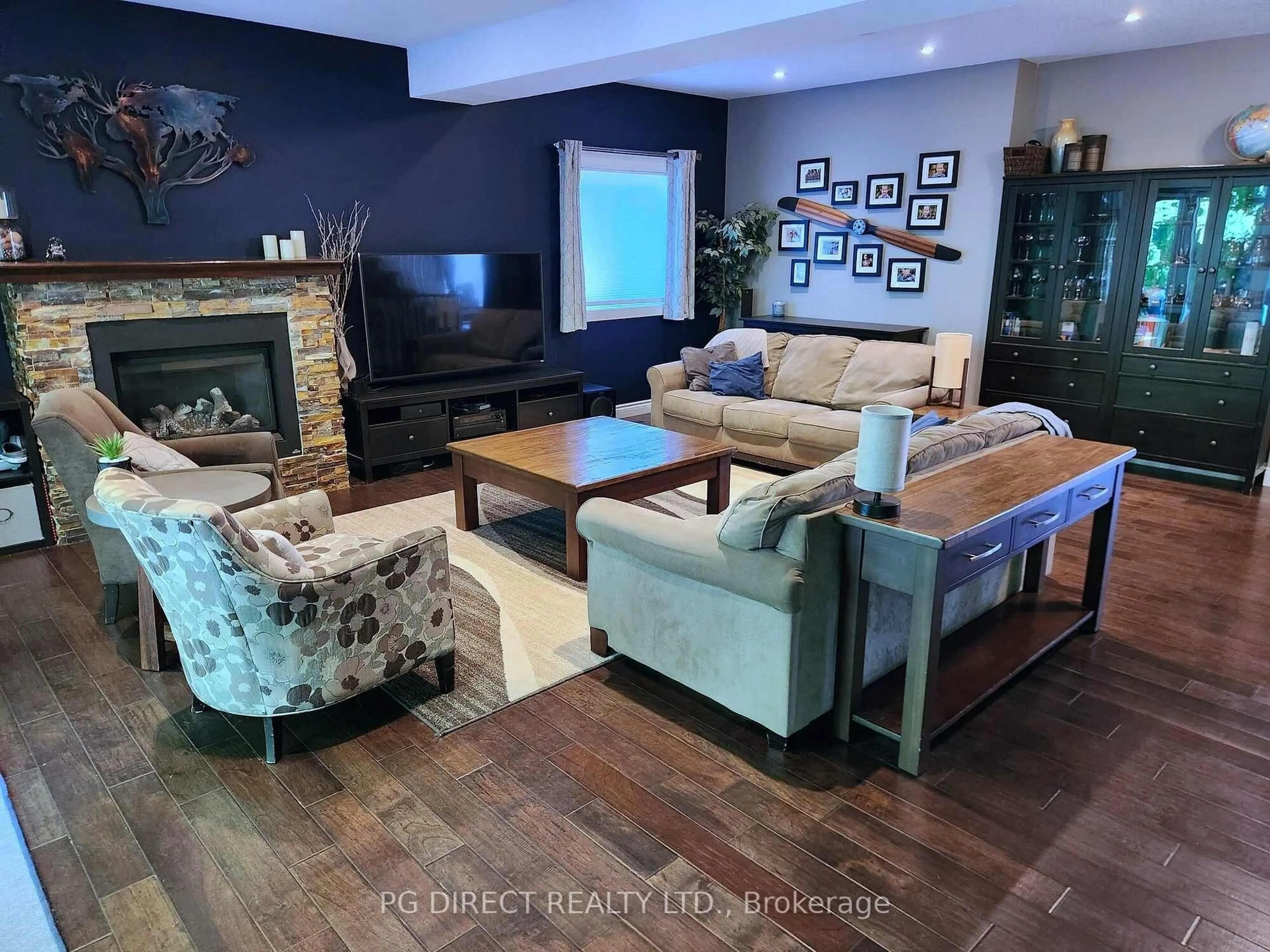 Living room with furniture, wood/laminate floor for 242 Cheltonwood Cres, Waterloo Ontario N2V 1X9