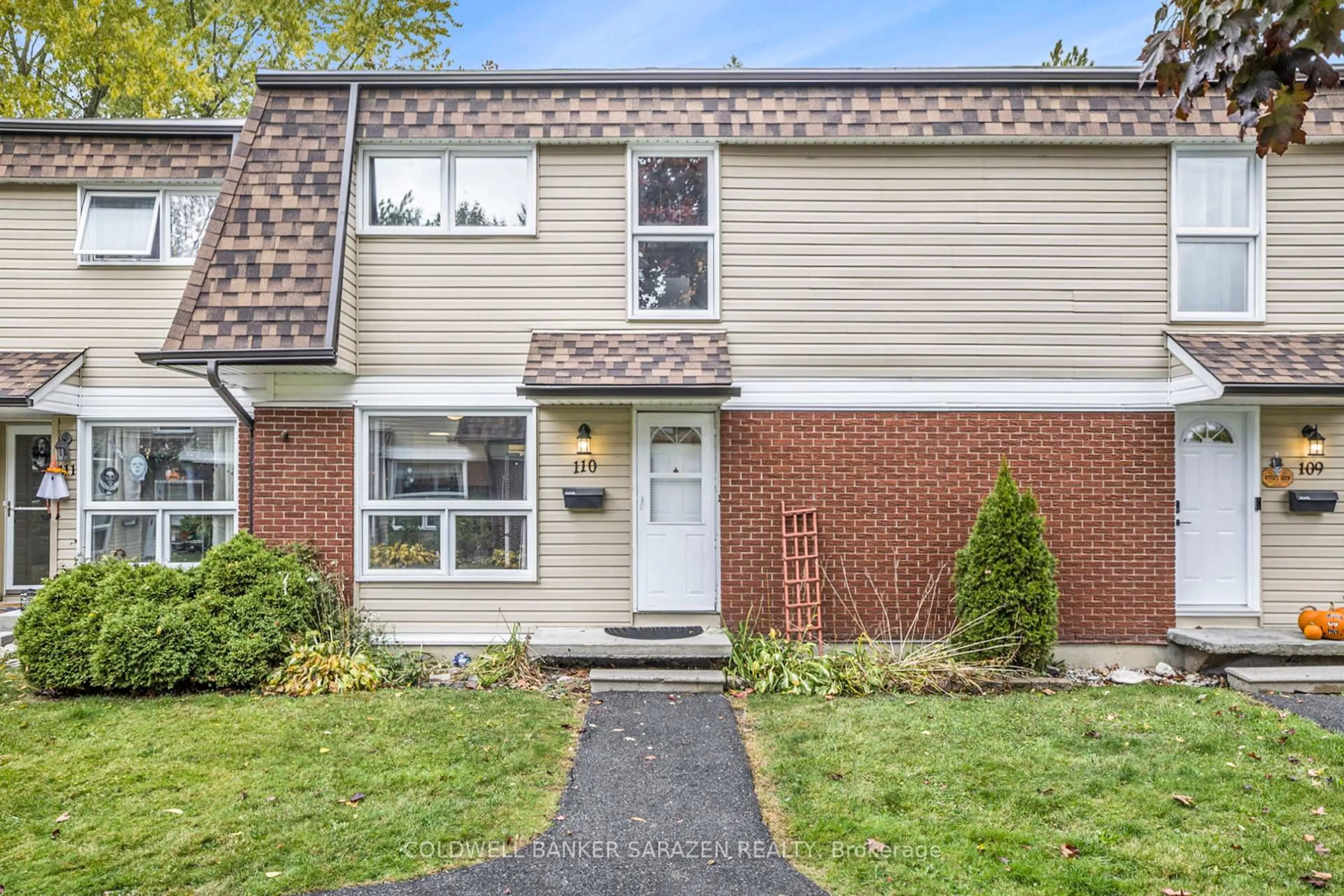 Home with vinyl exterior material, street for 110 Rutherford Crt #53, Ottawa Ontario K2K 1N5