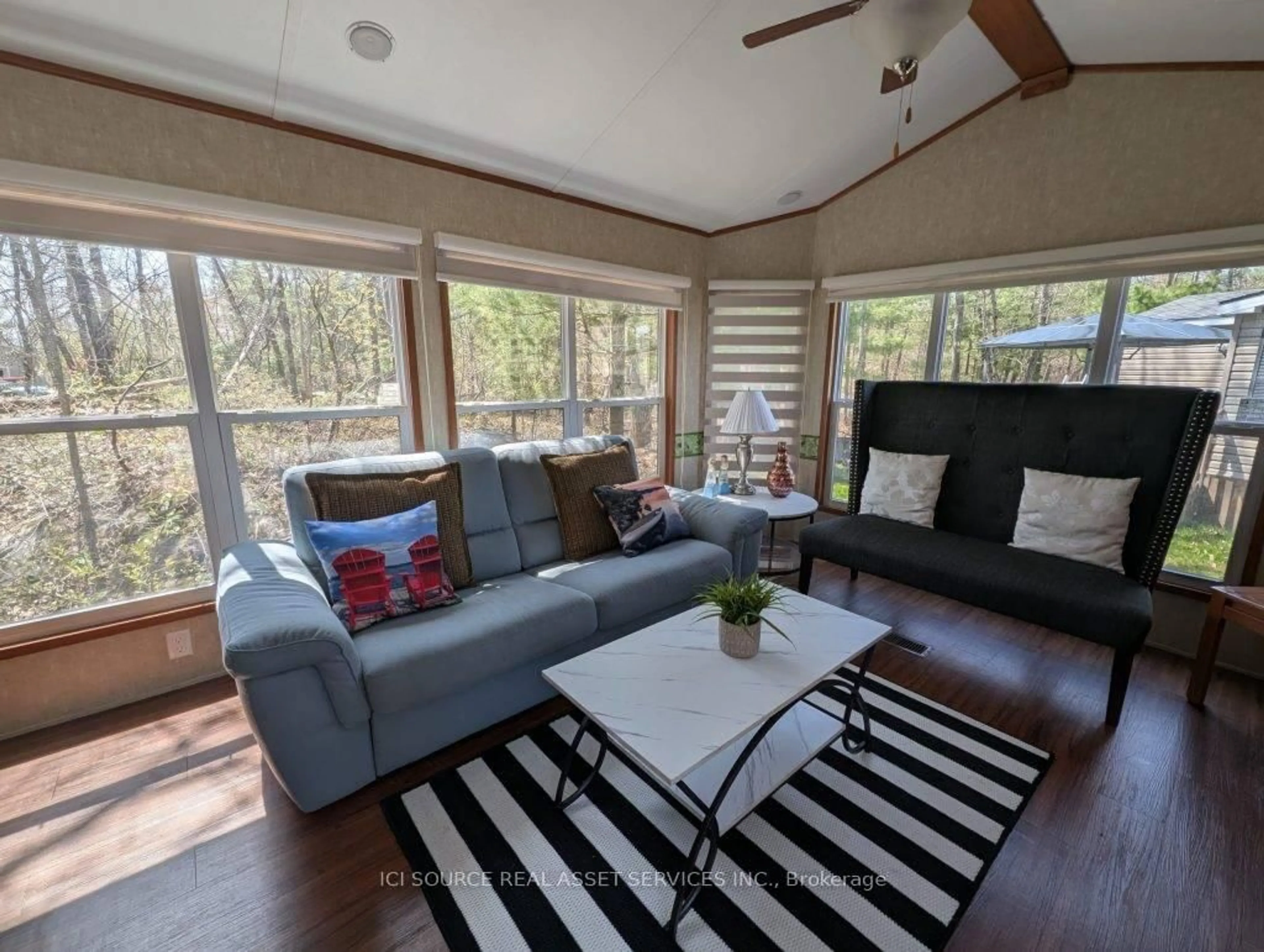 Living room with furniture, wood/laminate floor for 1336 S Morrison Lake Rd #MOR012, Gravenhurst Ontario P0E 1G0