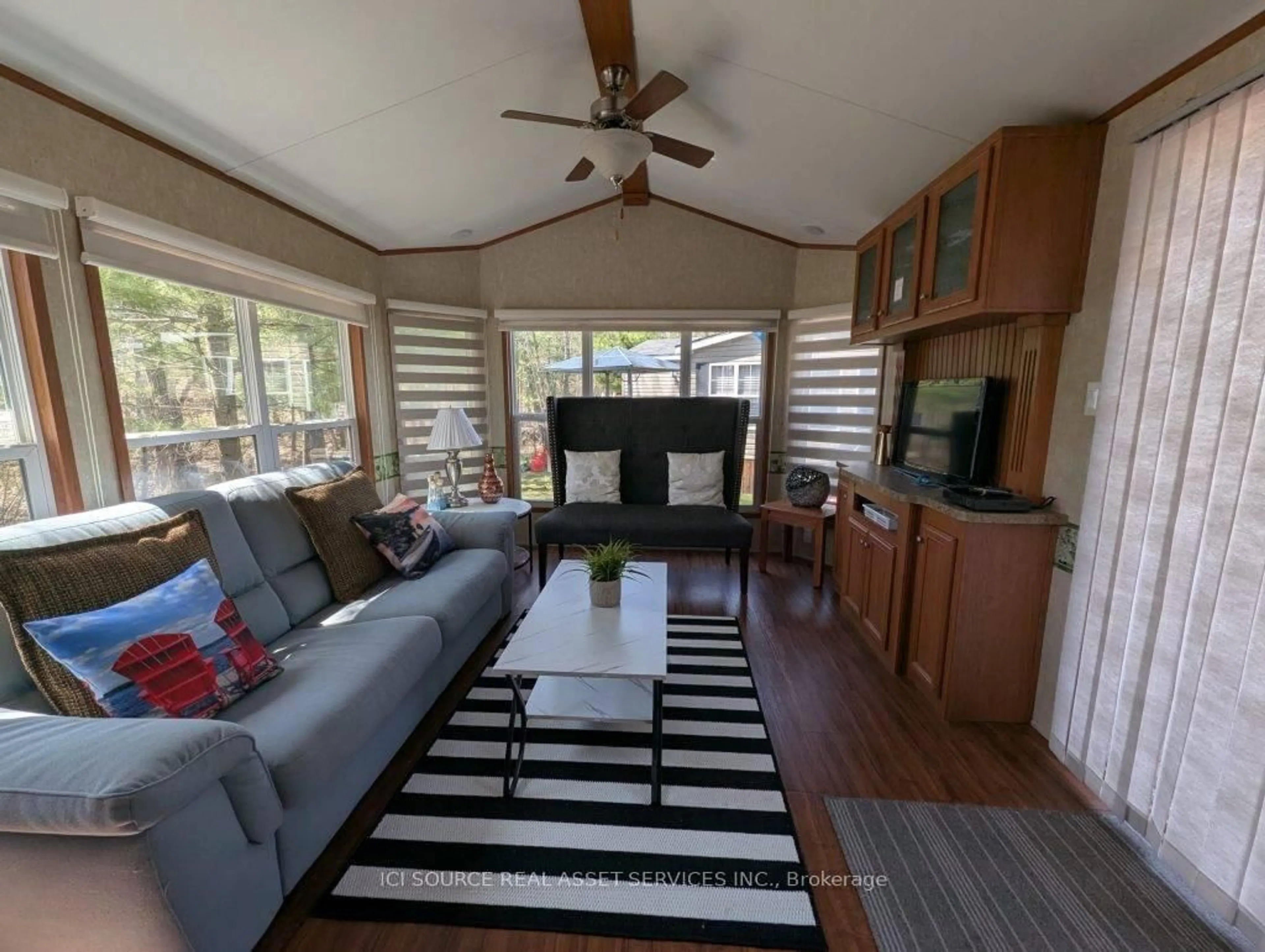 Living room with furniture, wood/laminate floor for 1336 S Morrison Lake Rd #MOR012, Gravenhurst Ontario P0E 1G0