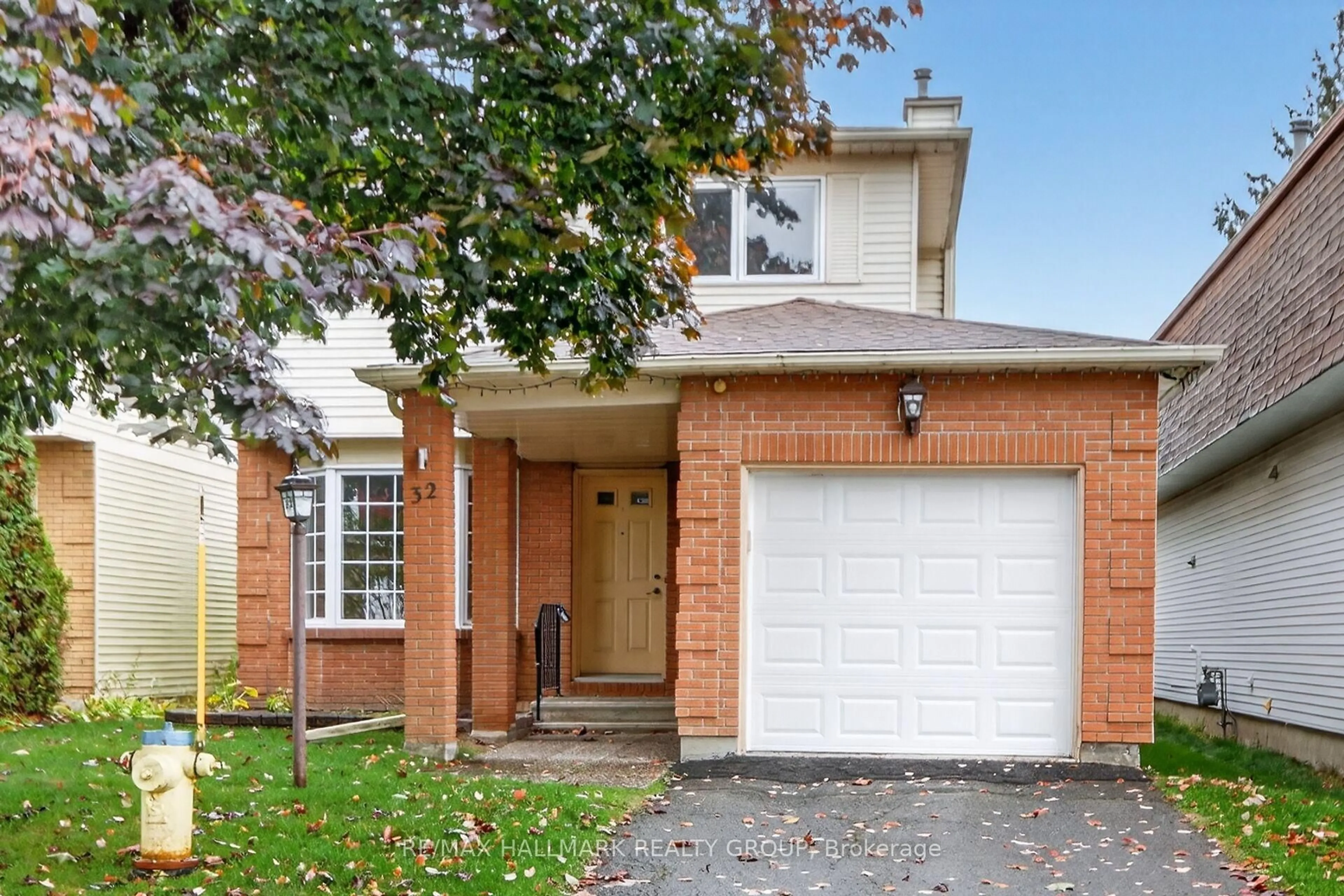 Home with brick exterior material, street for 32 Pheasant Run Dr, Nepean Ontario K2J 2R2