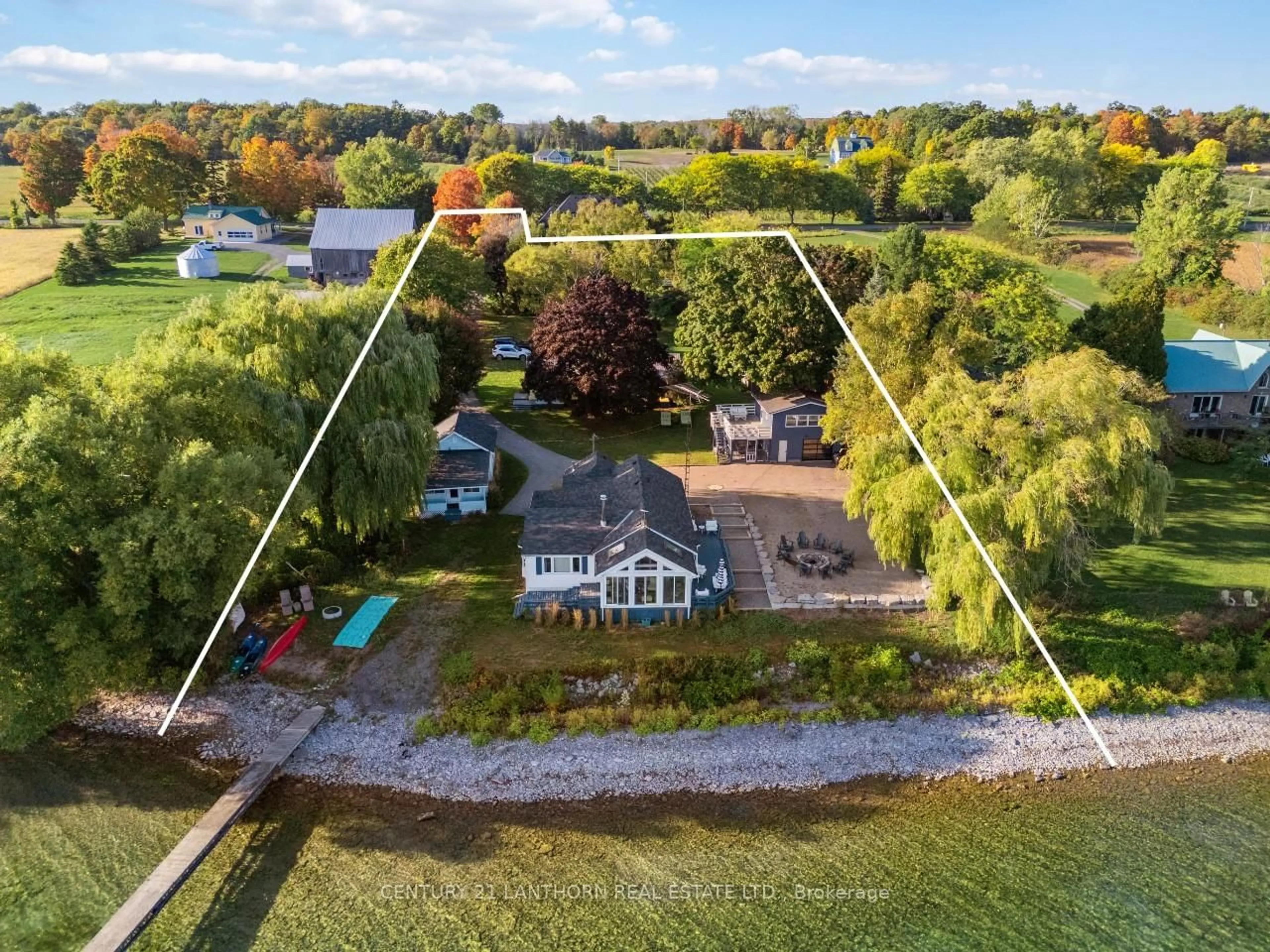 A pic from outside/outdoor area/front of a property/back of a property/a pic from drone, water/lake/river/ocean view for 2924 County Road 8, Prince Edward County Ontario K0K 2T0