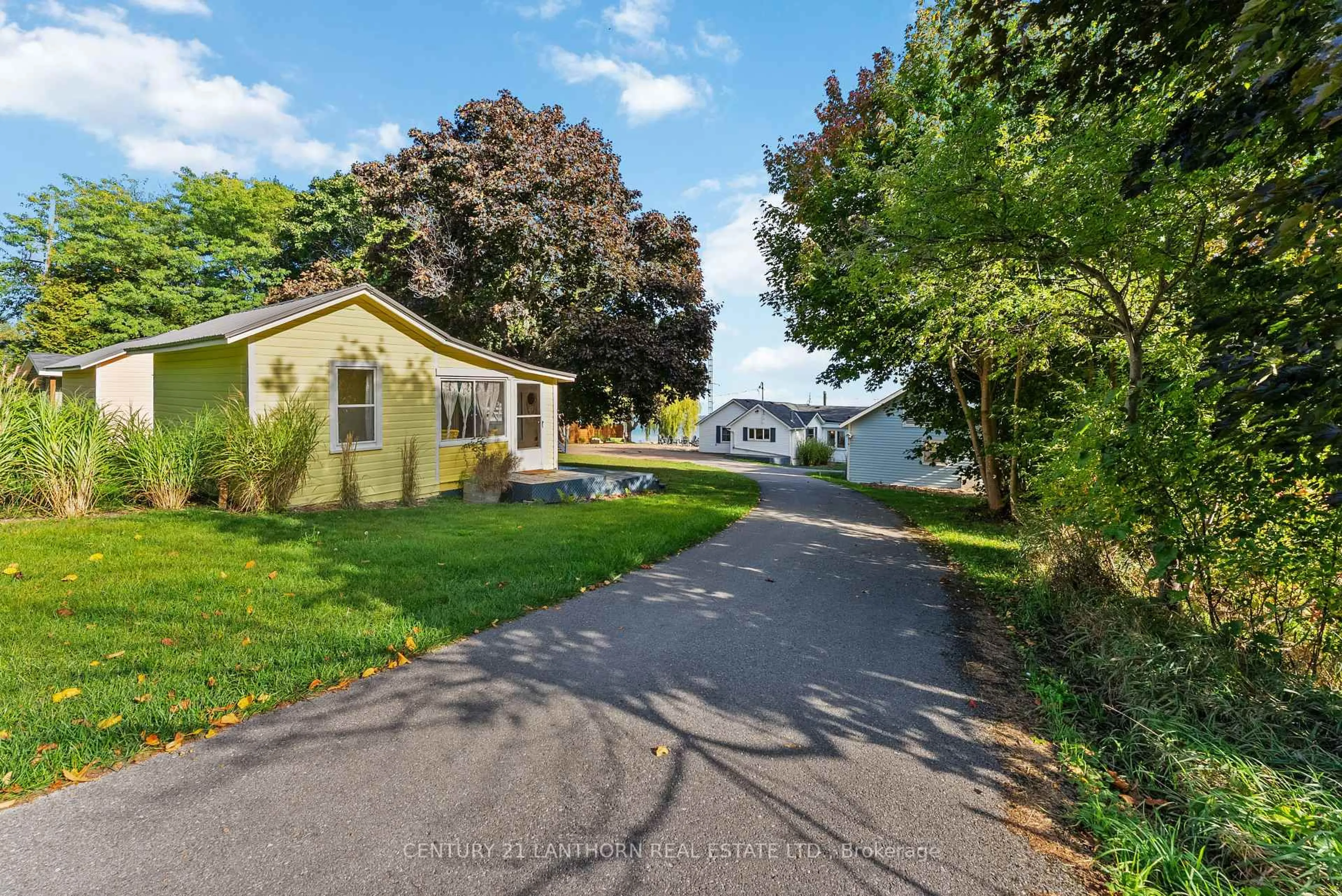 A pic from outside/outdoor area/front of a property/back of a property/a pic from drone, street for 2924 County Road 8, Prince Edward County Ontario K0K 2T0