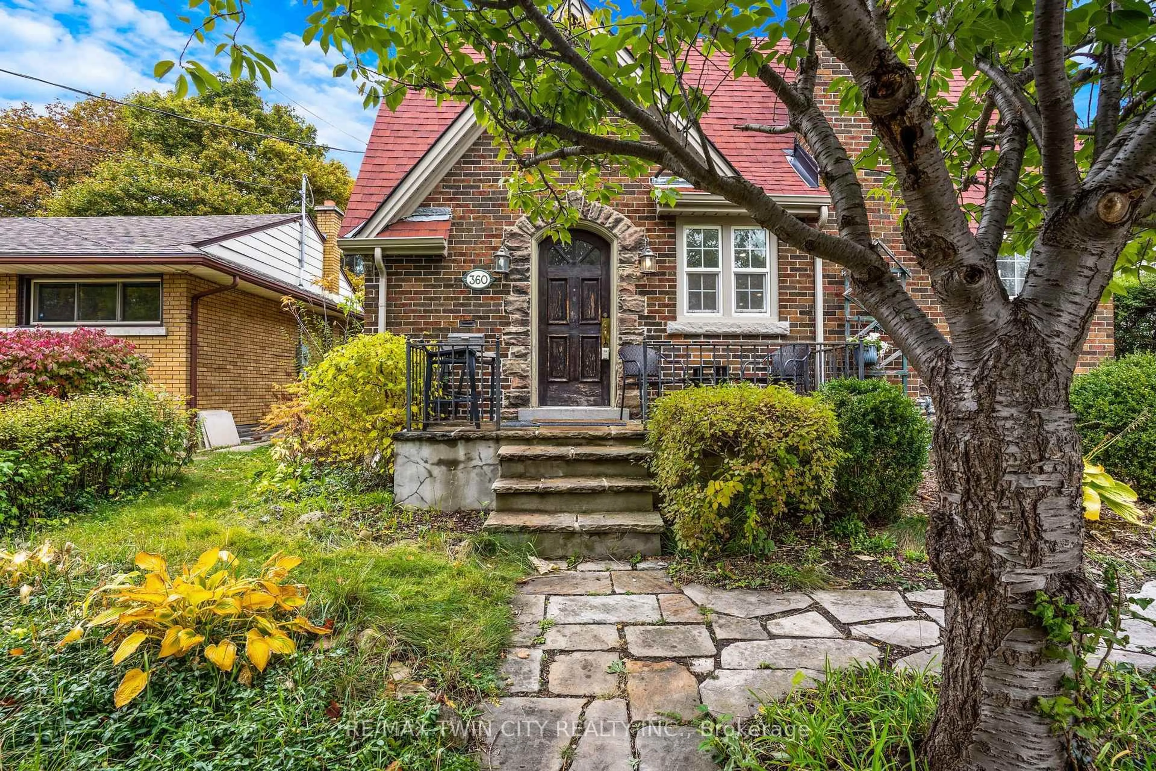 Home with brick exterior material, street for 360 Luella St, Kitchener Ontario N2H 2J4