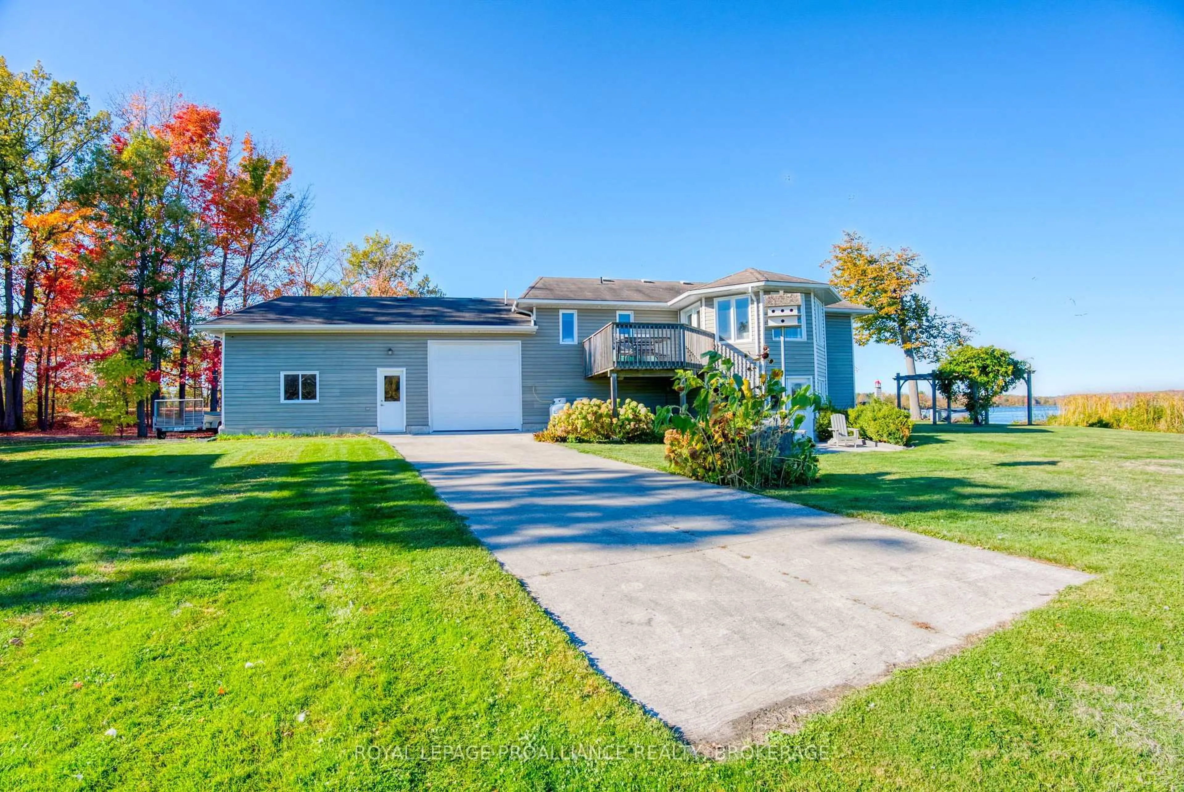 A pic from outside/outdoor area/front of a property/back of a property/a pic from drone, unknown for 2318 Highway 15, Kingston Ontario K7L 4V3